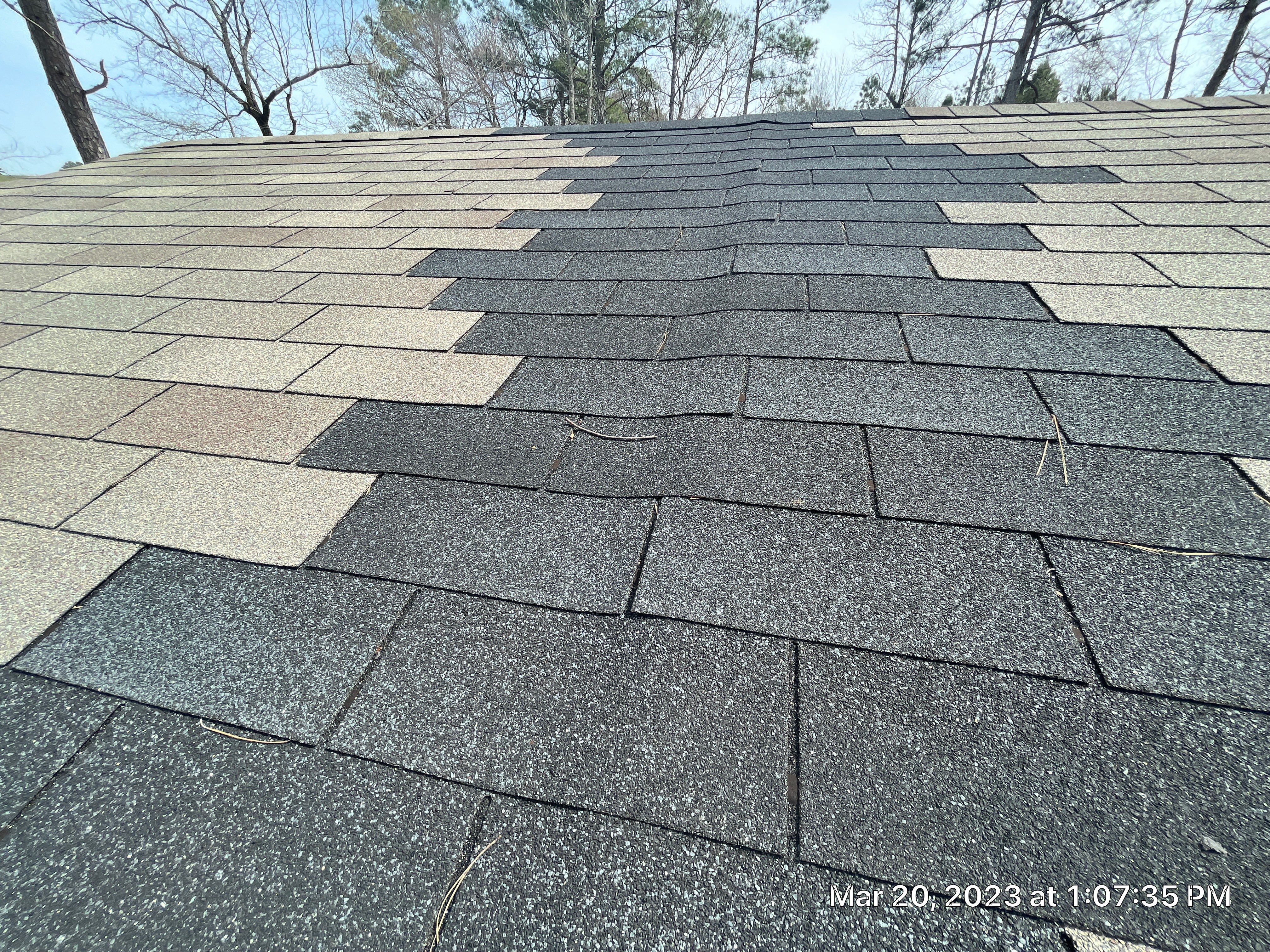 Residential Roofing Installation using 26 Gauge Colored Panels by Hostetler Roofing