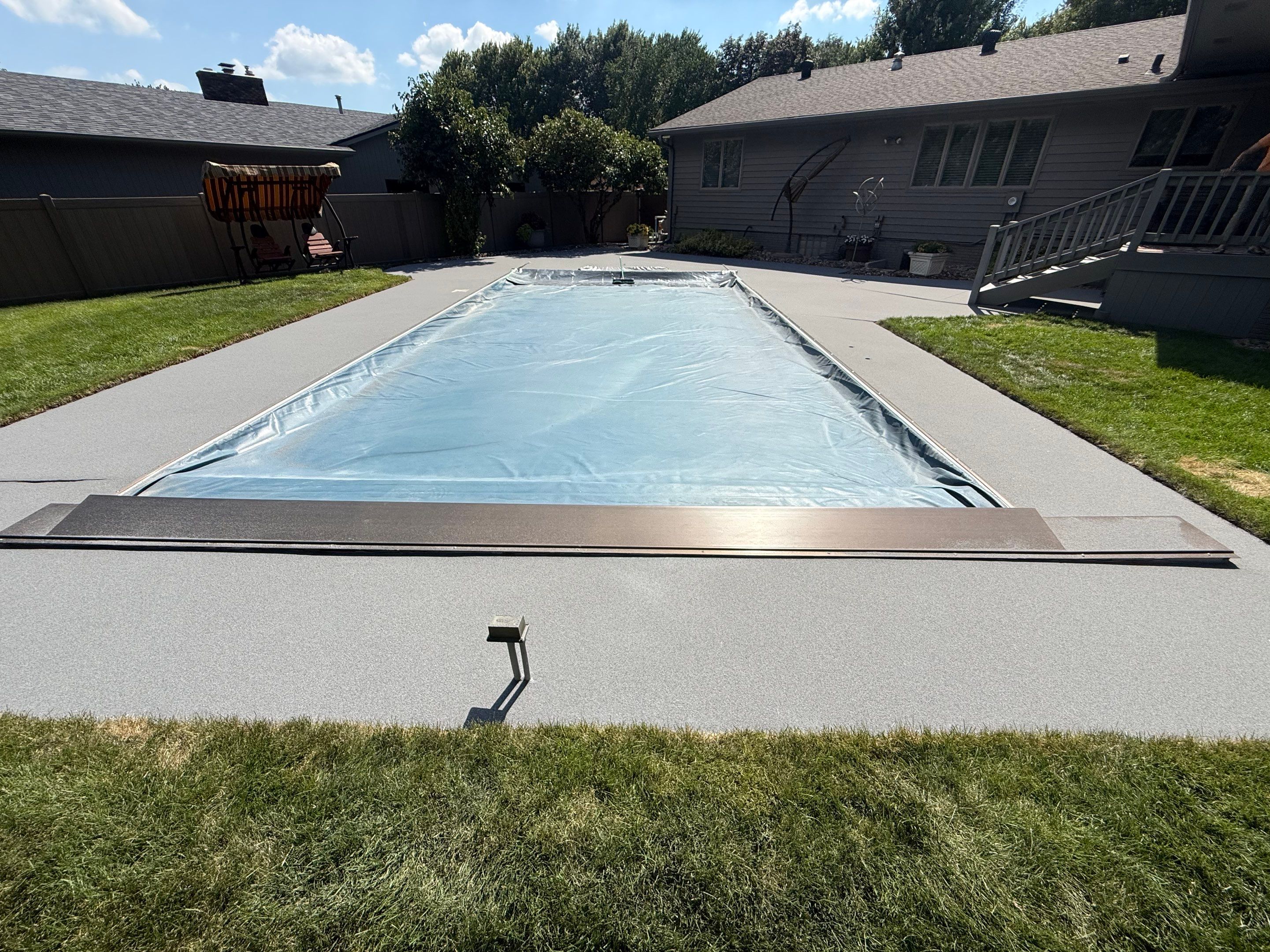 Residential Pool Deck Resurfacing in Sioux Falls by Select Painting, Coatings & Garage Cabinets