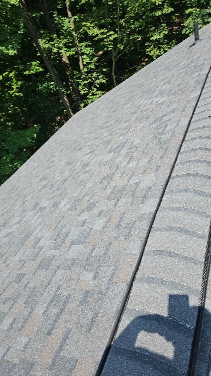 Owens Corning Color: Williamsburg Gray by Eagle Eye Roofing