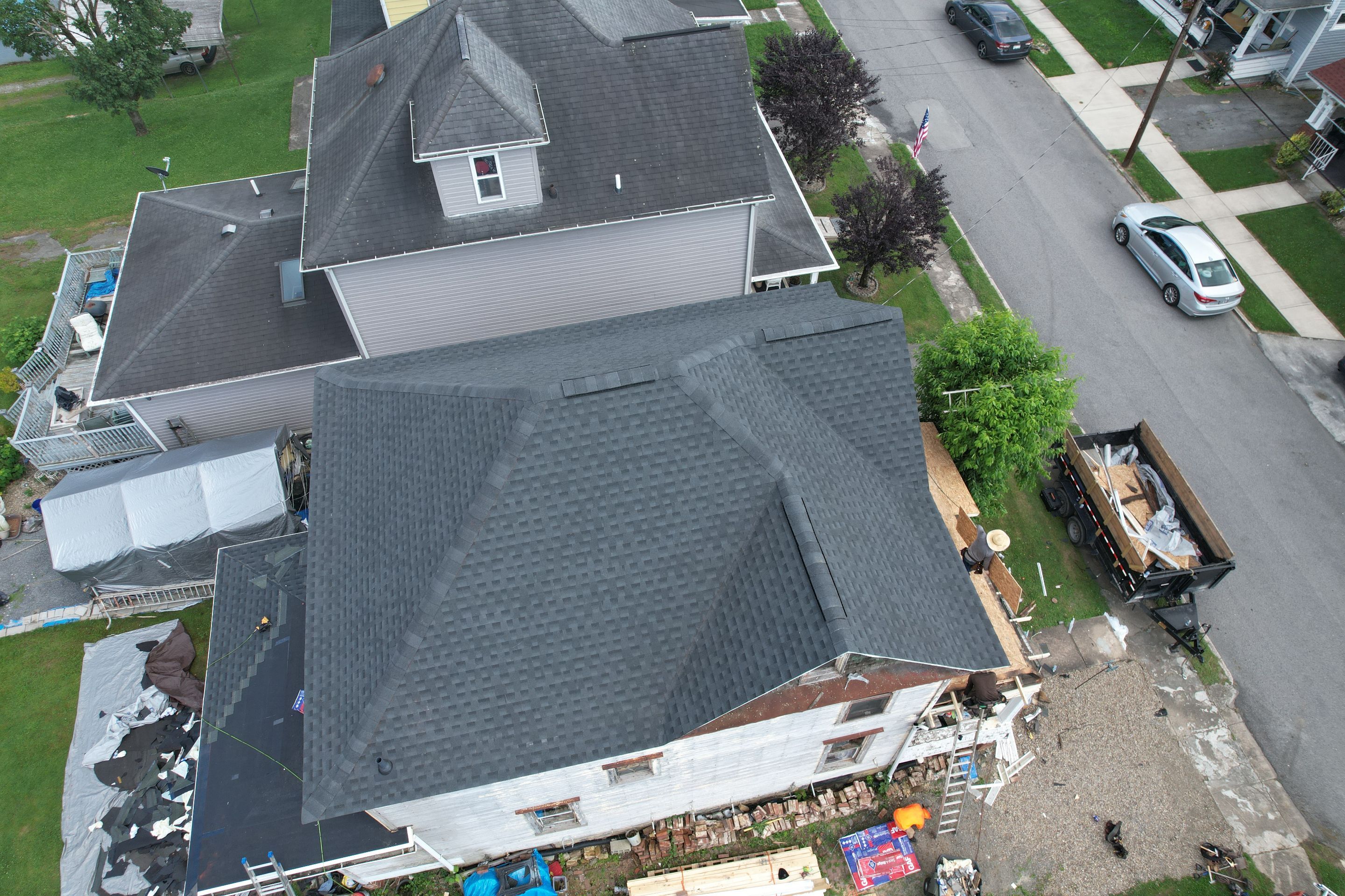 Residential Roofing Installation using GAF Timberline HDZ Charcoal by Rainstoppers Roofing