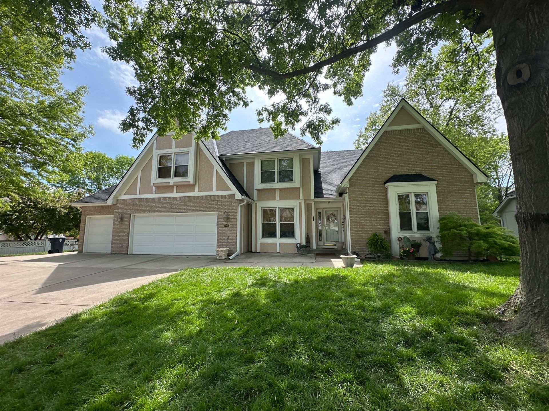 Comprehensive Roof Replacement and Skylight Installation in Kansas City by Liberty Roofing