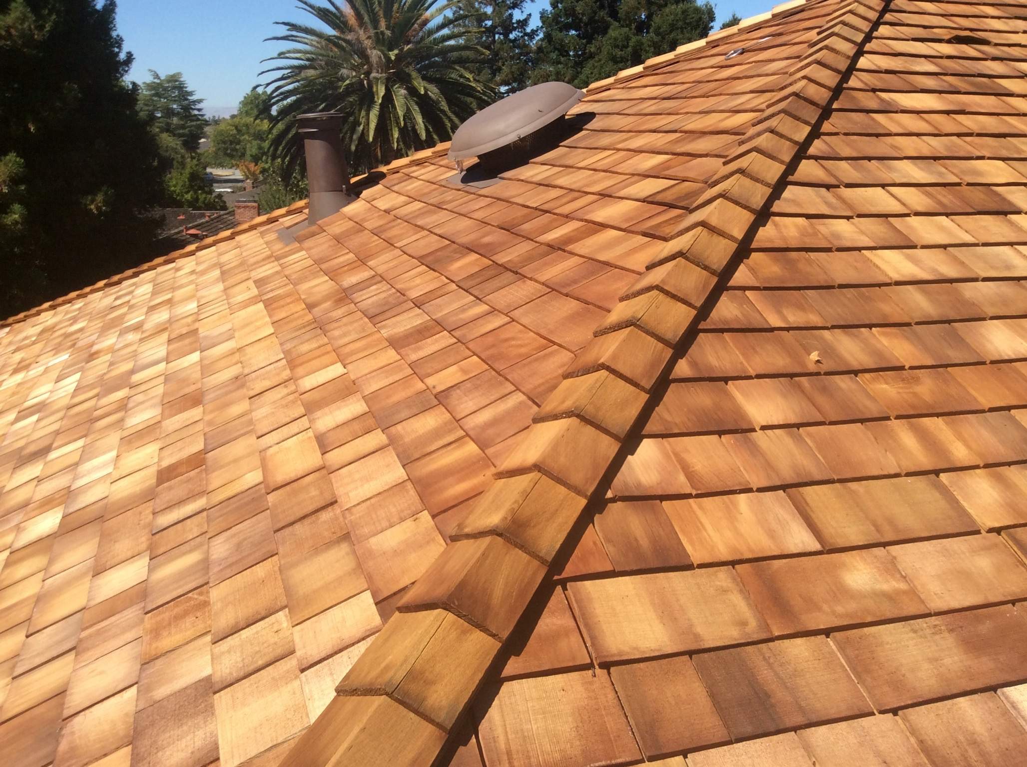 Custom Cedar Shake Roof Replacement for Saratoga Craftsman Home by Eastman Roofing & Waterproofing Inc.
