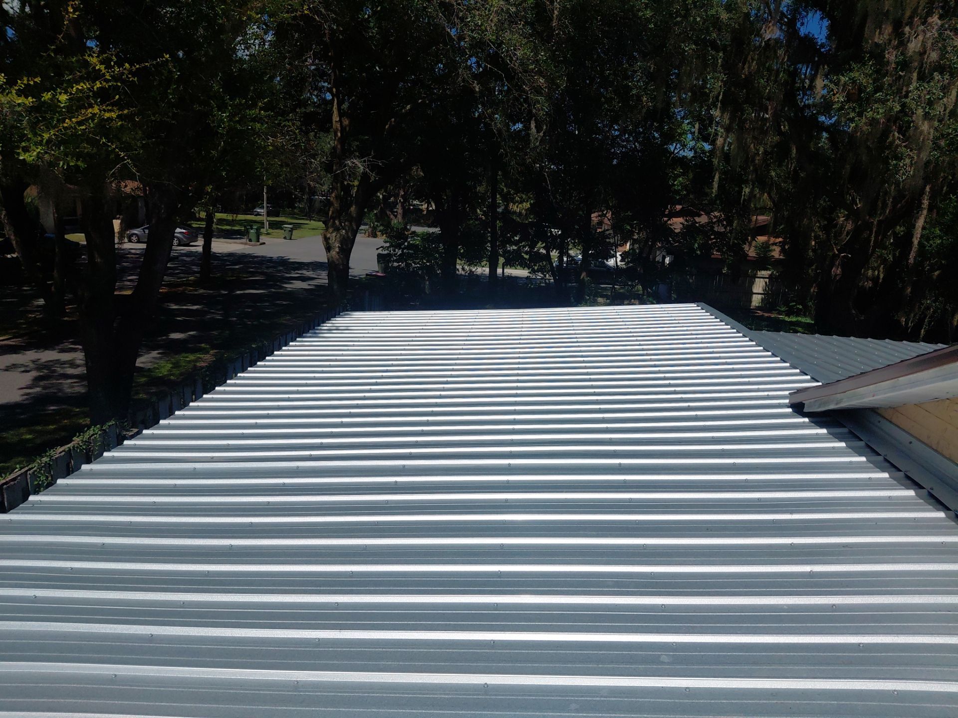 Combined Shingle and Metal Residential Roof Replacement in Leesburg Florida by Pinnacle Roofing Group