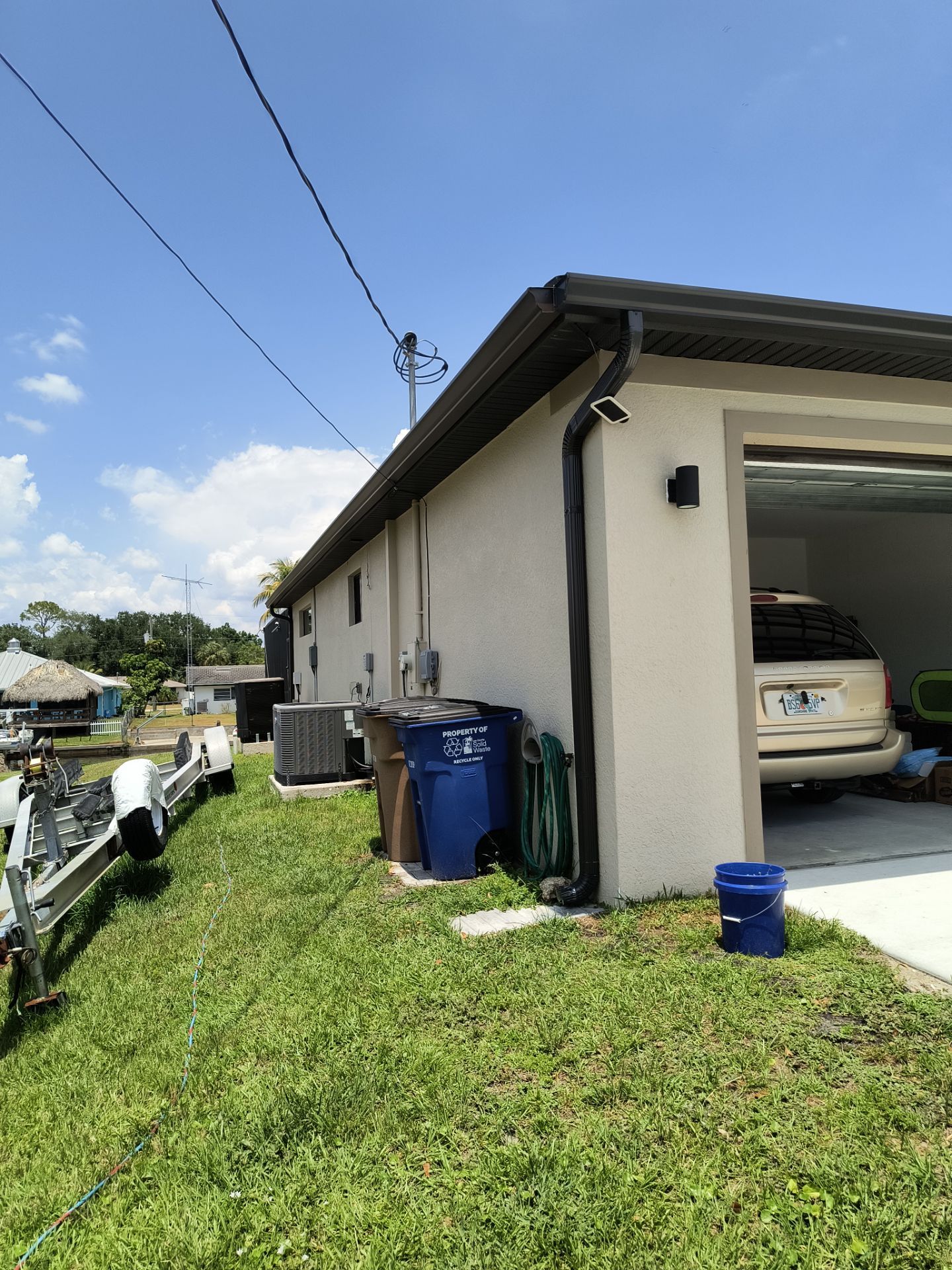 Custom Seamless Gutters and Downspouts for Large Homes in Tampa FL by Gutter Professor by Gutter Professors