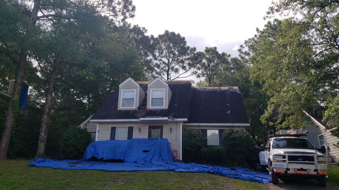 Residential Roofing Installation using Roof Replacement by American Roofing & Construction LLC