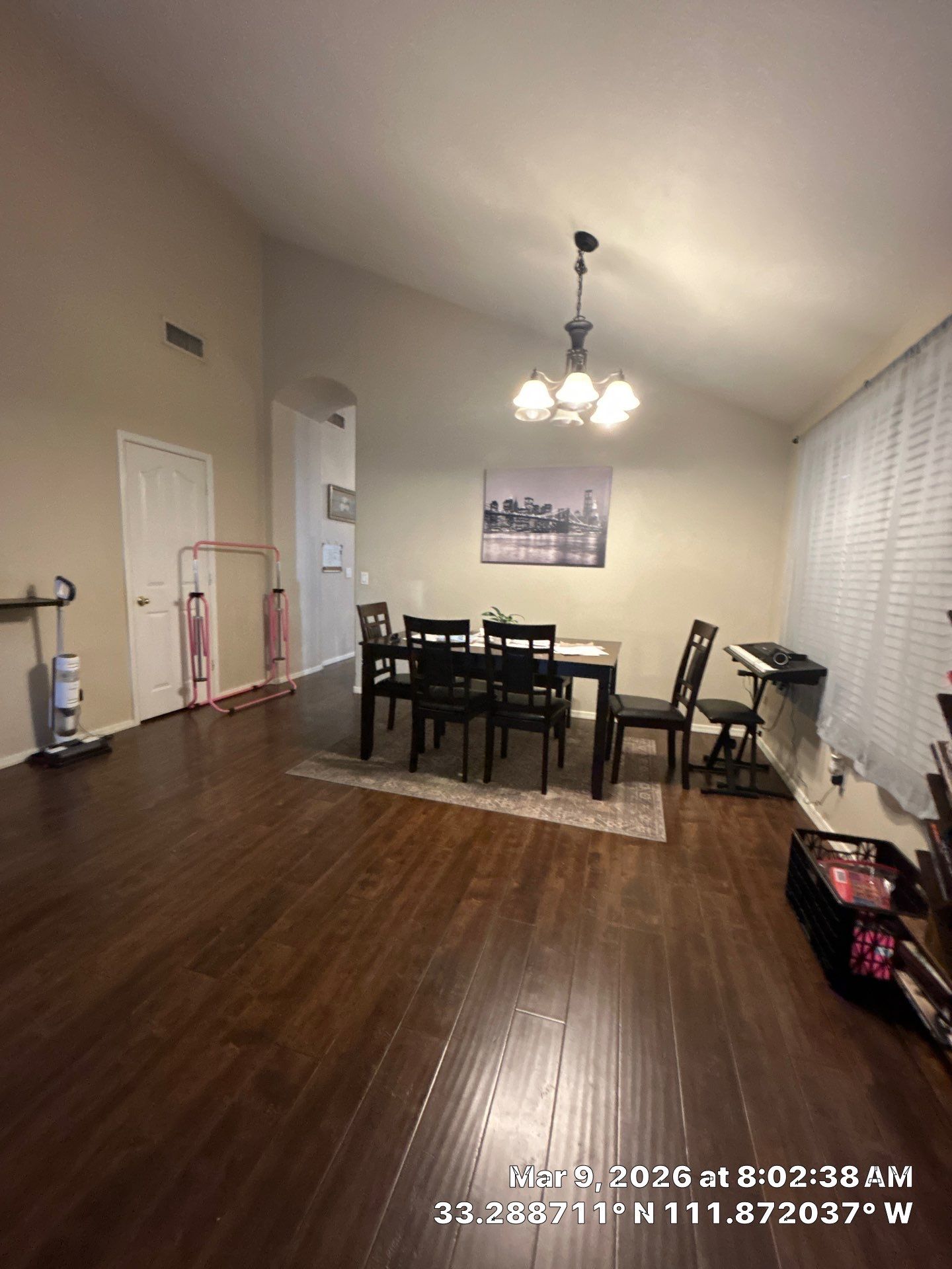 Interior Dining Room Renovation with Dark Wood Flooring by CompanyCam Sales Demo