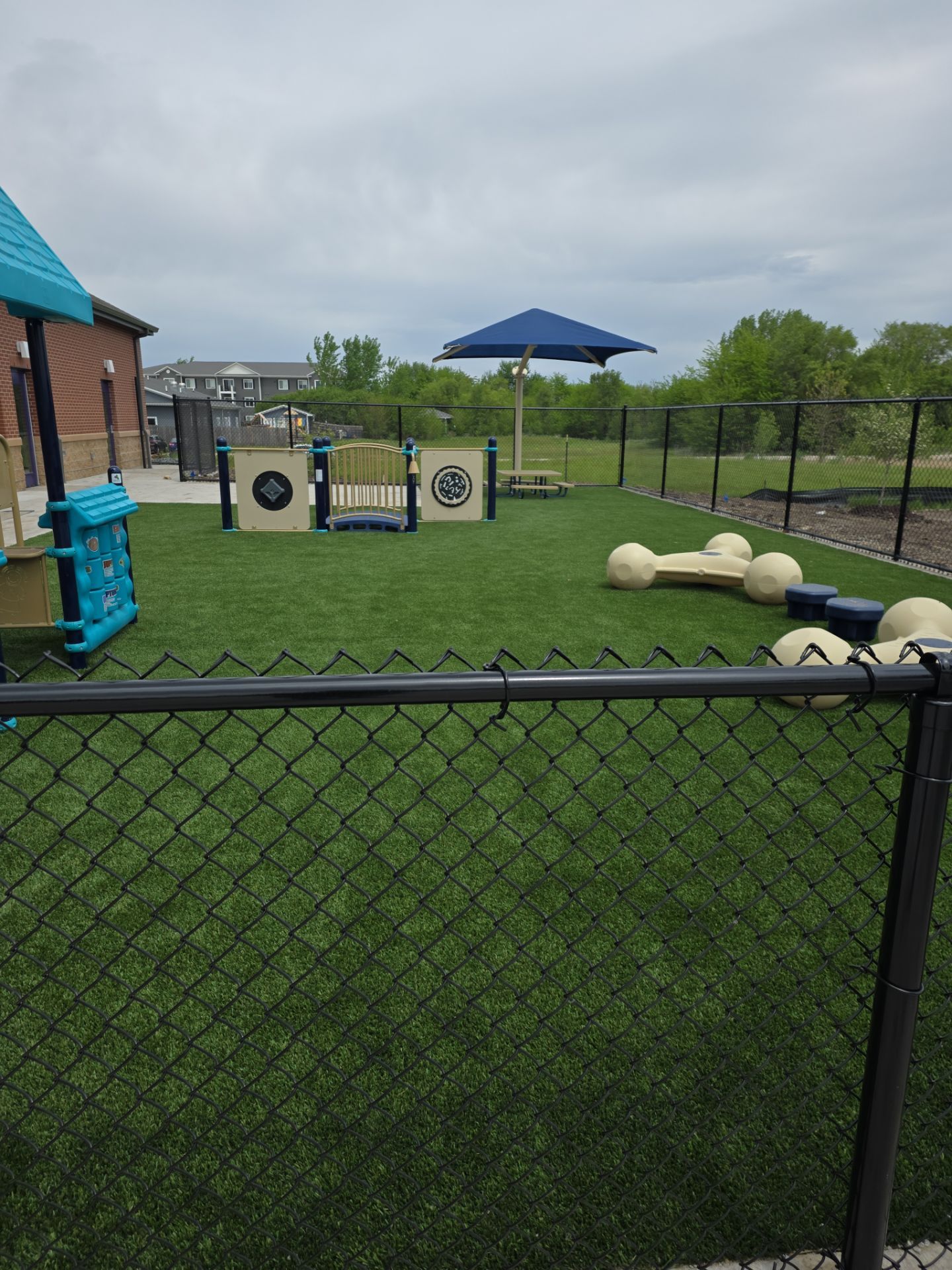 Everbrook in Grimes Playground Equipment & Turf by Southwest Greens Midwest
