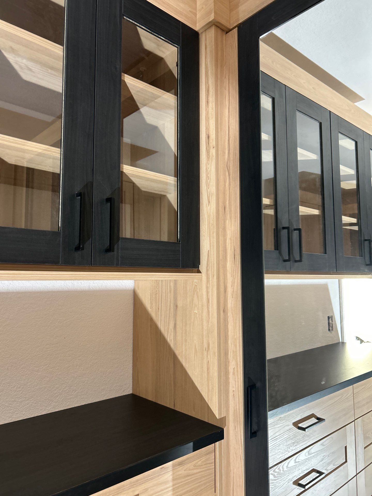 Two-Tone Closet with matching Mudroom + Laundry Room by Concept 32, Inc.