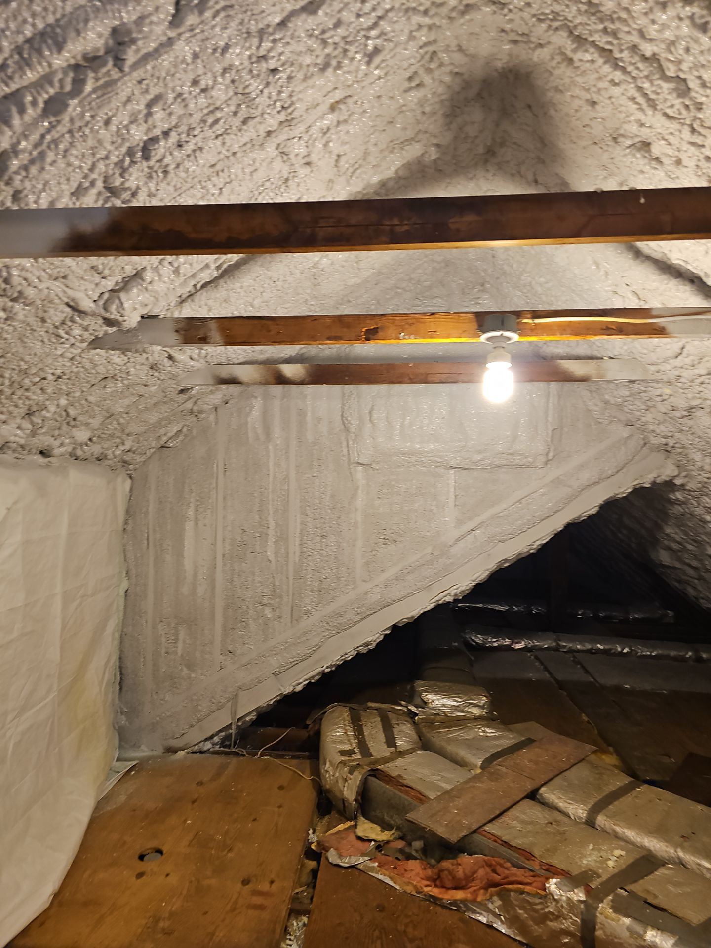 Attic Retrofit using open cell spray foam by NYS Foam & Energy