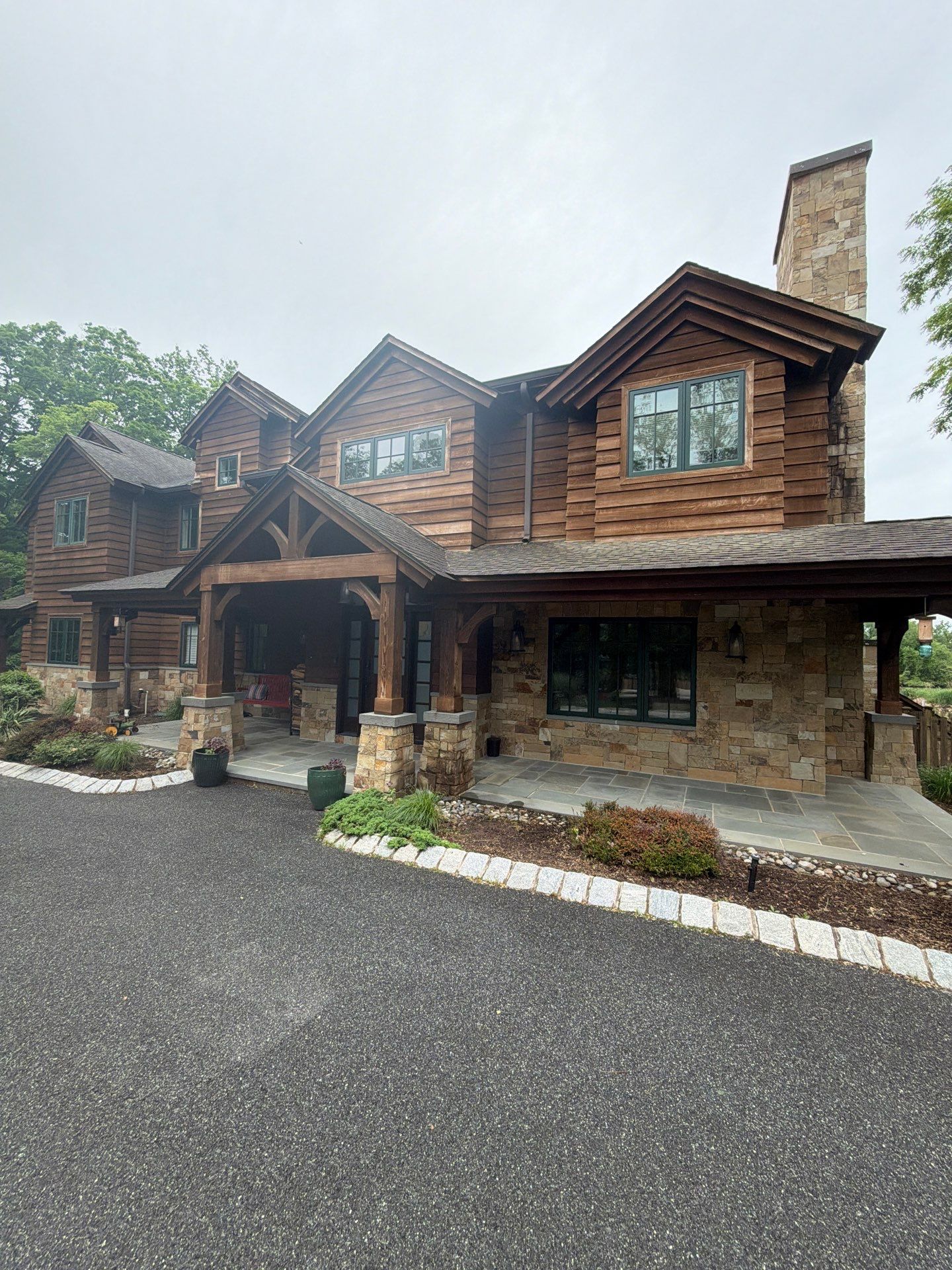 Exterior Powerwashing and Maintenance for a Teaneck Timber Home by Spectrum Painting, LLC