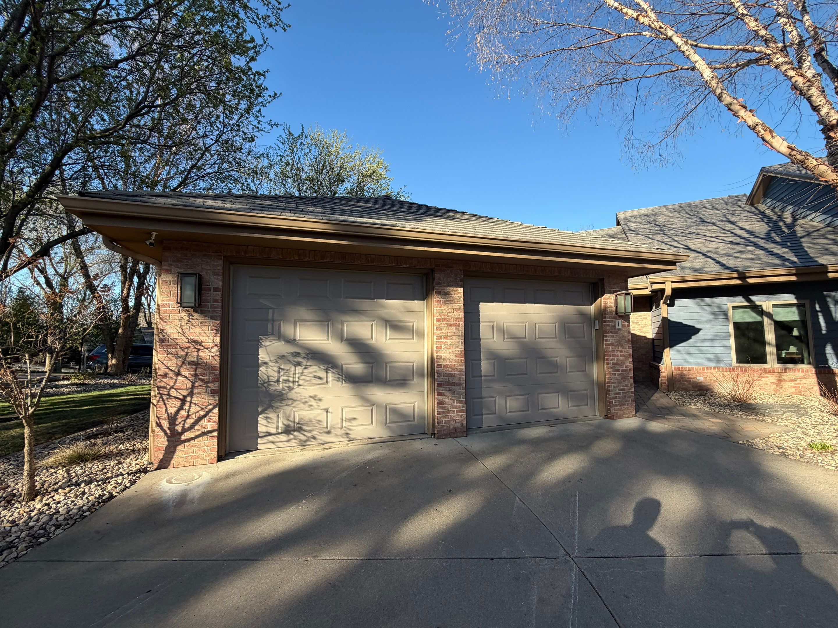 Residential Exterior Painting and Siding Refresh in Sioux Falls by Select Painting, Coatings & Garage Cabinets