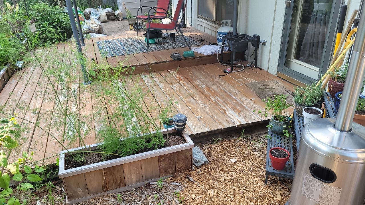 Back Yard Stamped Concrete Patio by LAND ESCAPES LLC