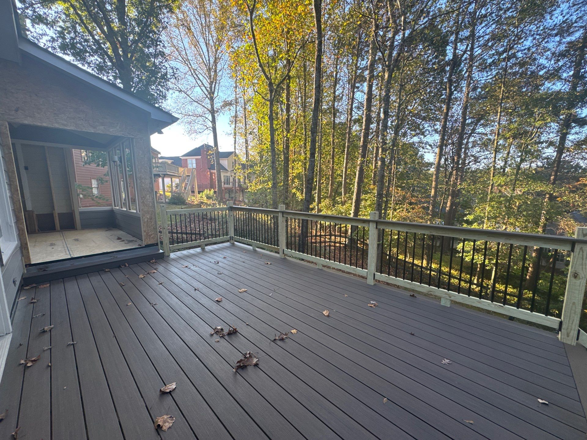 Custom Multi-Level Composite Deck and Sunroom Addition in Suwanee by Swift Home Renovations 