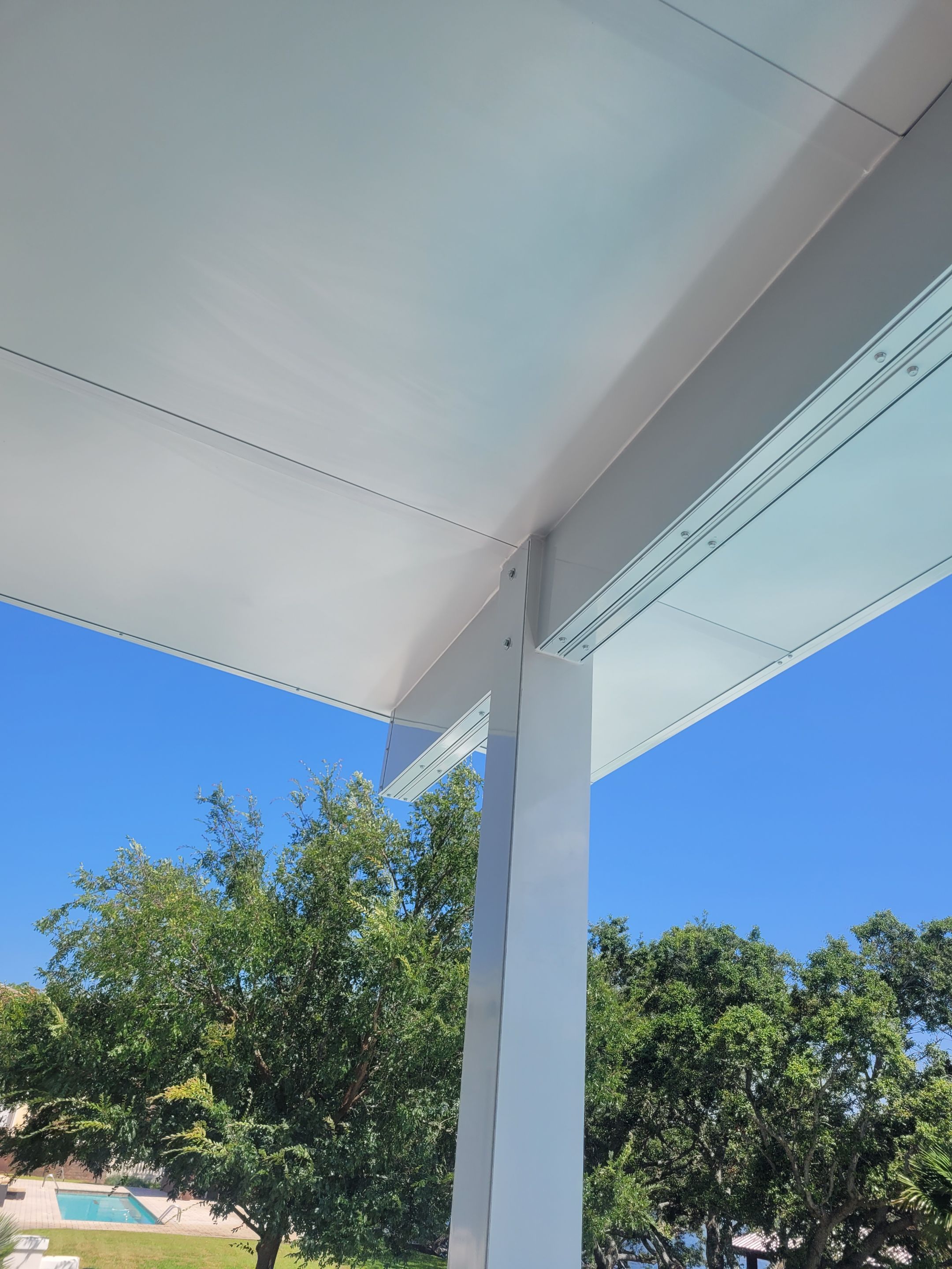 Poolside Colorbeam Patio Cover in Gulf Breeze by Titan Sunrooms