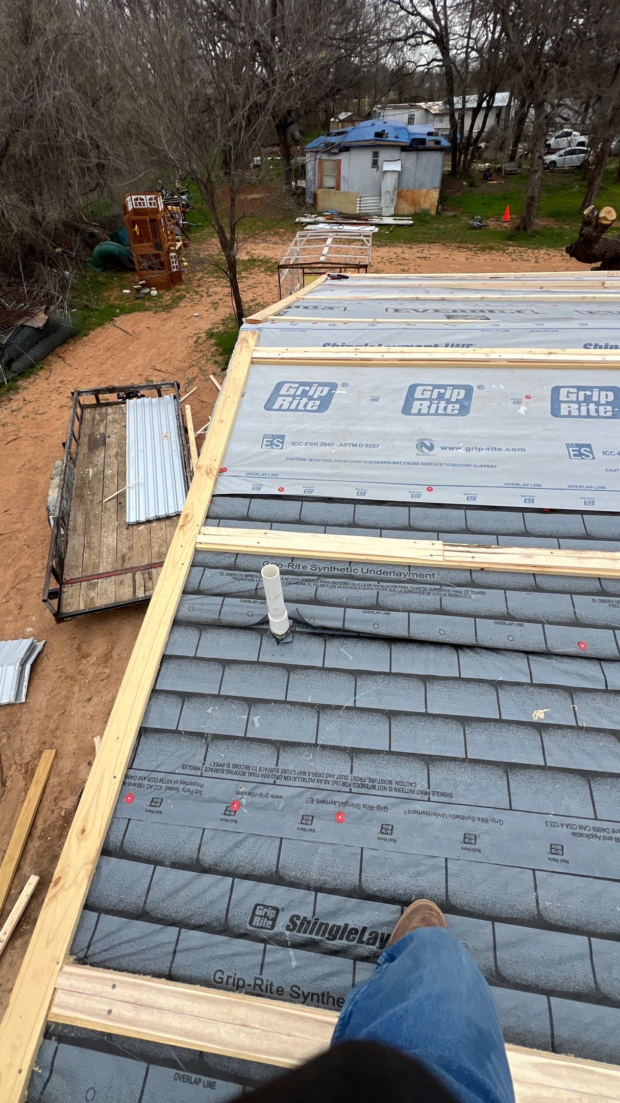 Residential Roofing Installation using PBR Metal Roof by Harvey Roofing & Construction