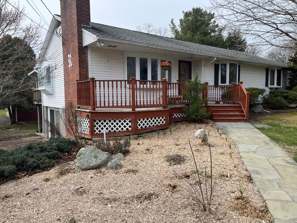 Deck Replacement, Trex Tiki torch boards, with White composite railing and lattice. by DiGiorgi Roofing and Siding Inc