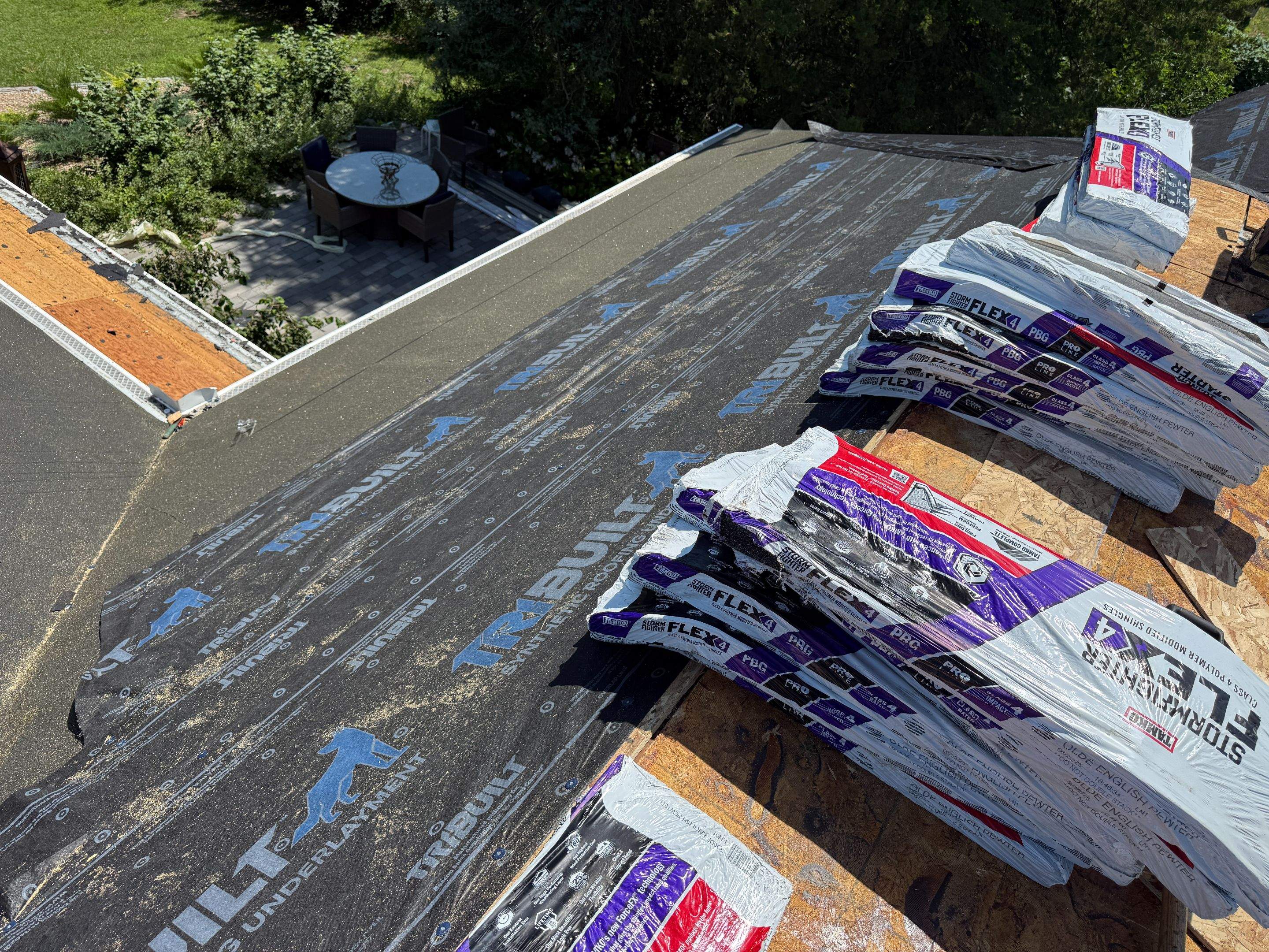 Asphalt Shingle and EPDM Membrane Roof Installation in Mineola by Star Home