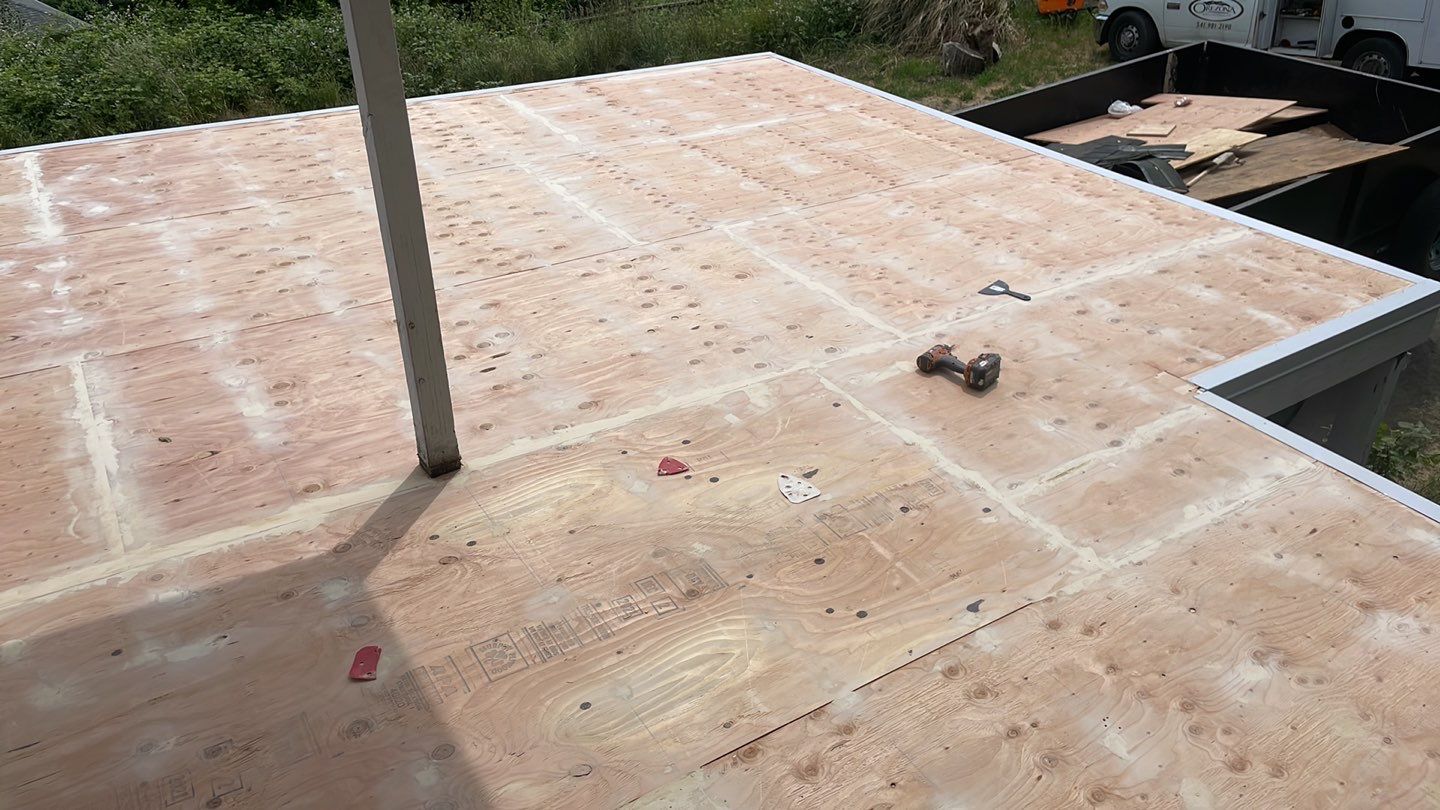 Residential Deck Replacement using Dec-Tec Membrane Color: Grafton by Orezona Building & Roofing Company, Inc.