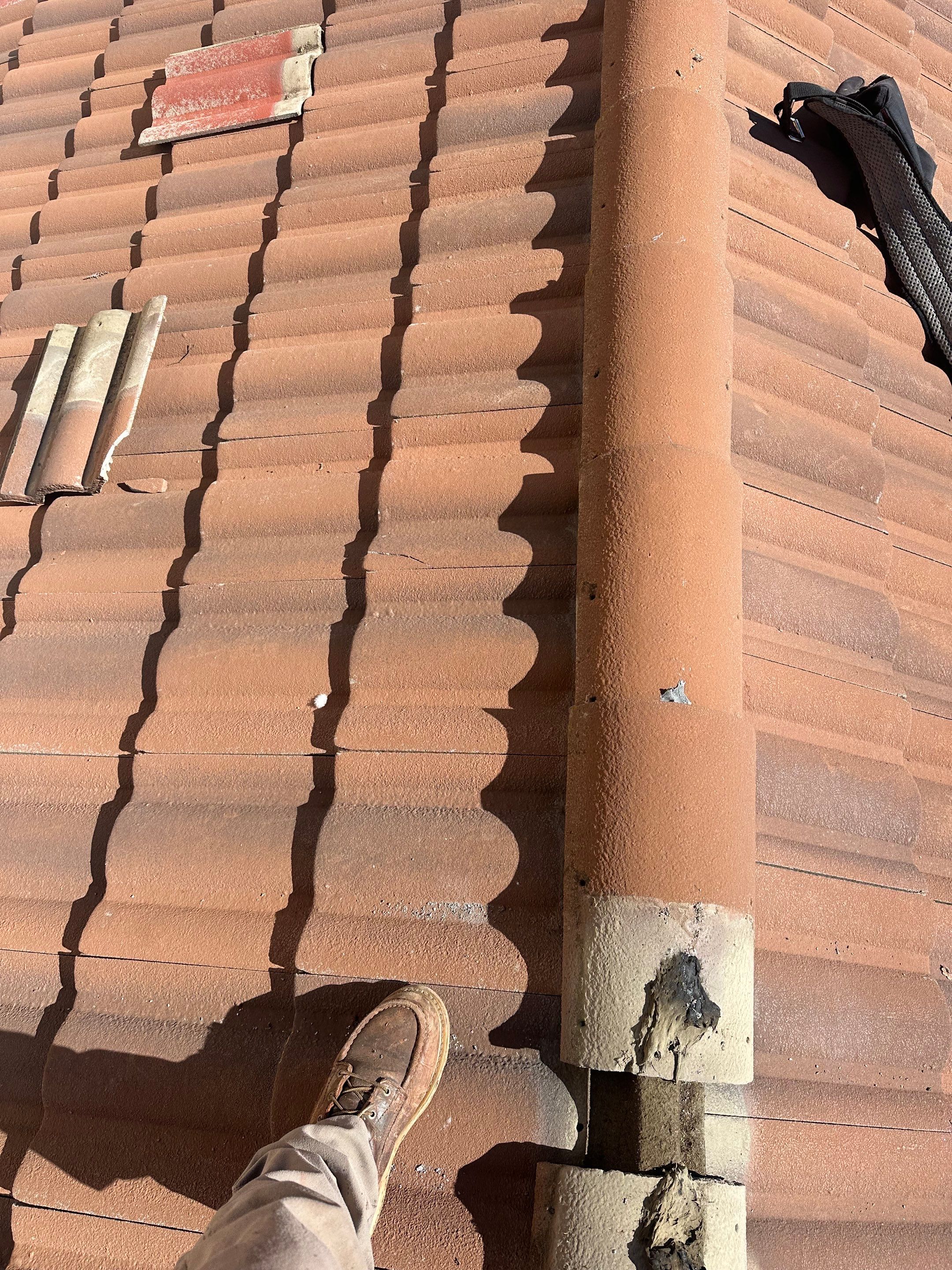 Tile Roof repair by Grandmark Service Company