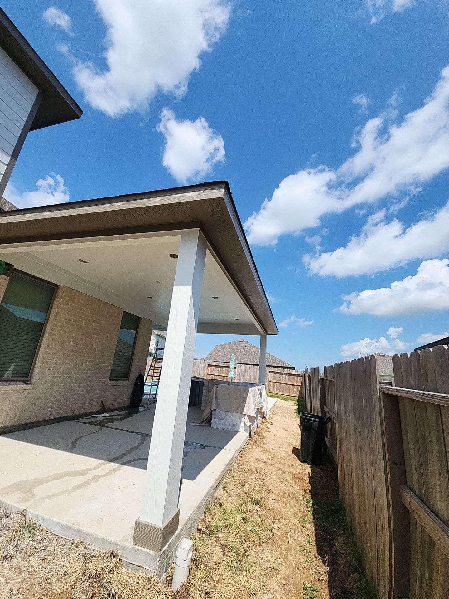 Patio and Summer Kitchen in Texas city by SophAlx LLC