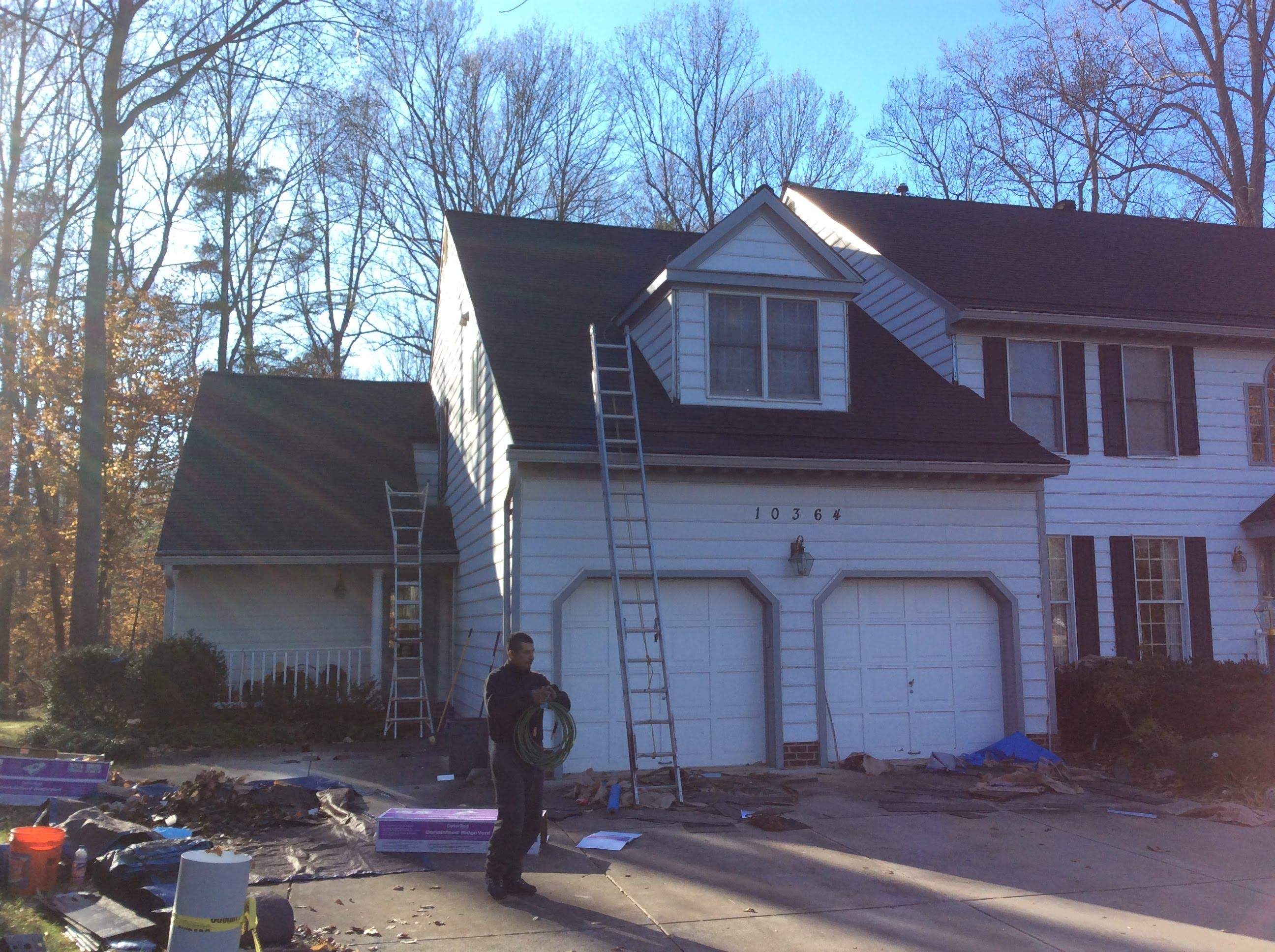 Residential Roofing Installation using Charcoal Black by Alpha Design Services