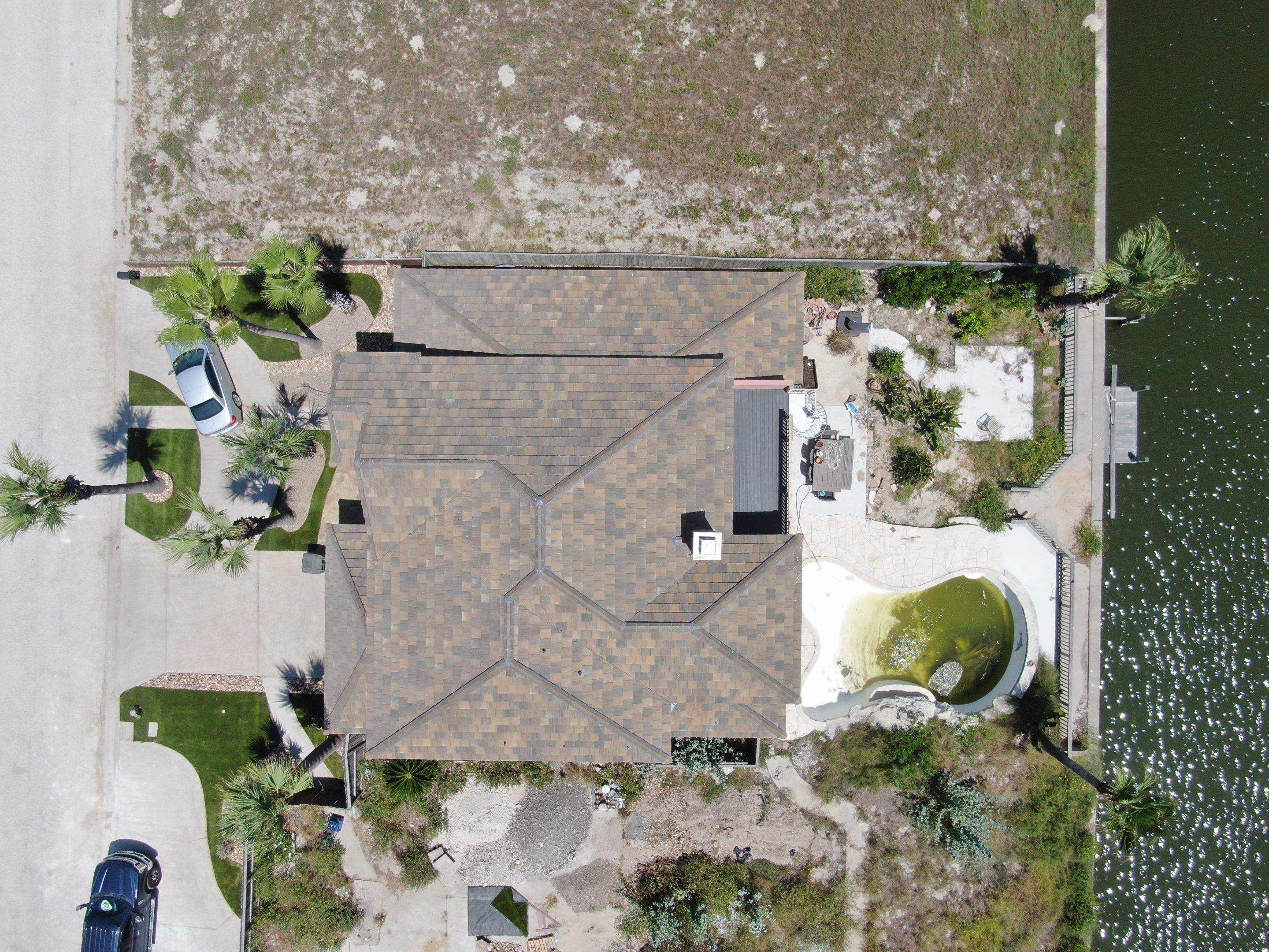 Busted to Beautiful! by Bayfront Roofing and Construction