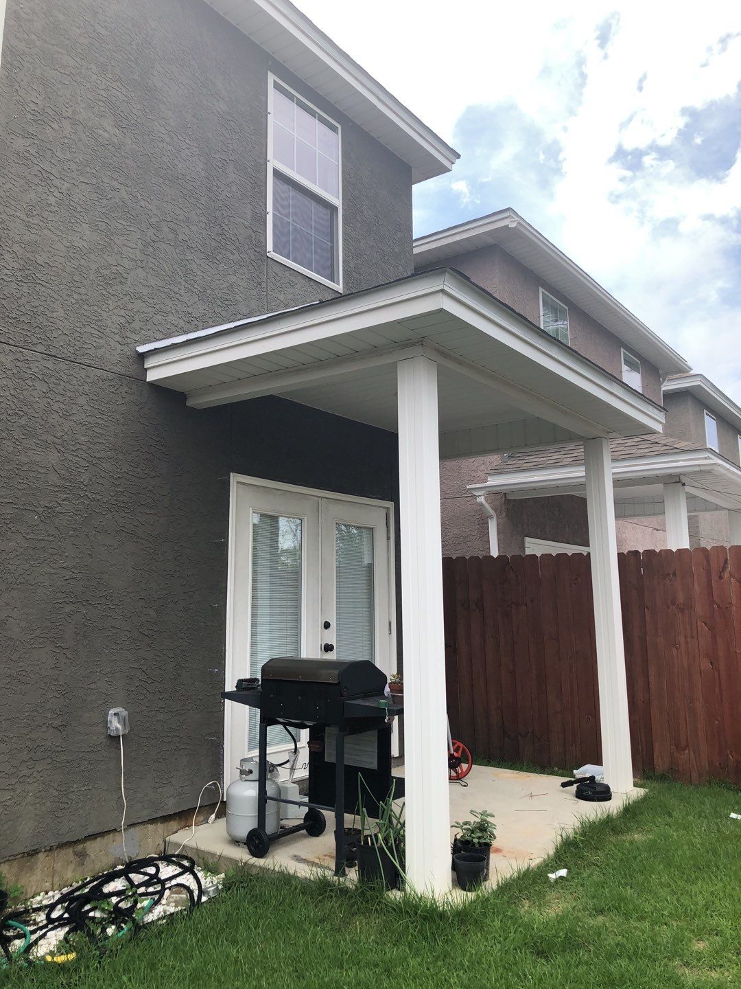 Seamless Gutter Installation using White K-Style Gutters by Gutter Professors