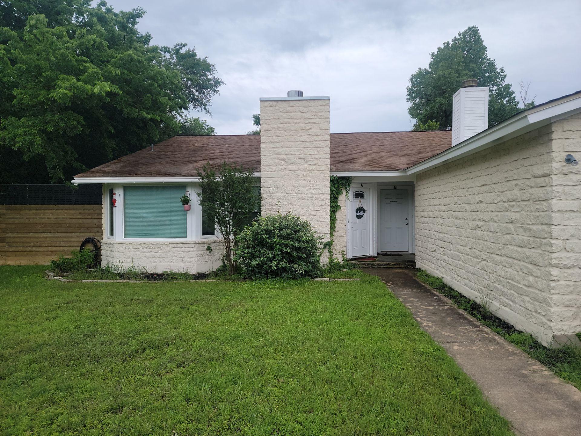 Residential Roof Replacement using GAF - Ultra HDZ - Weathered Wood by Action Exteriors Austin