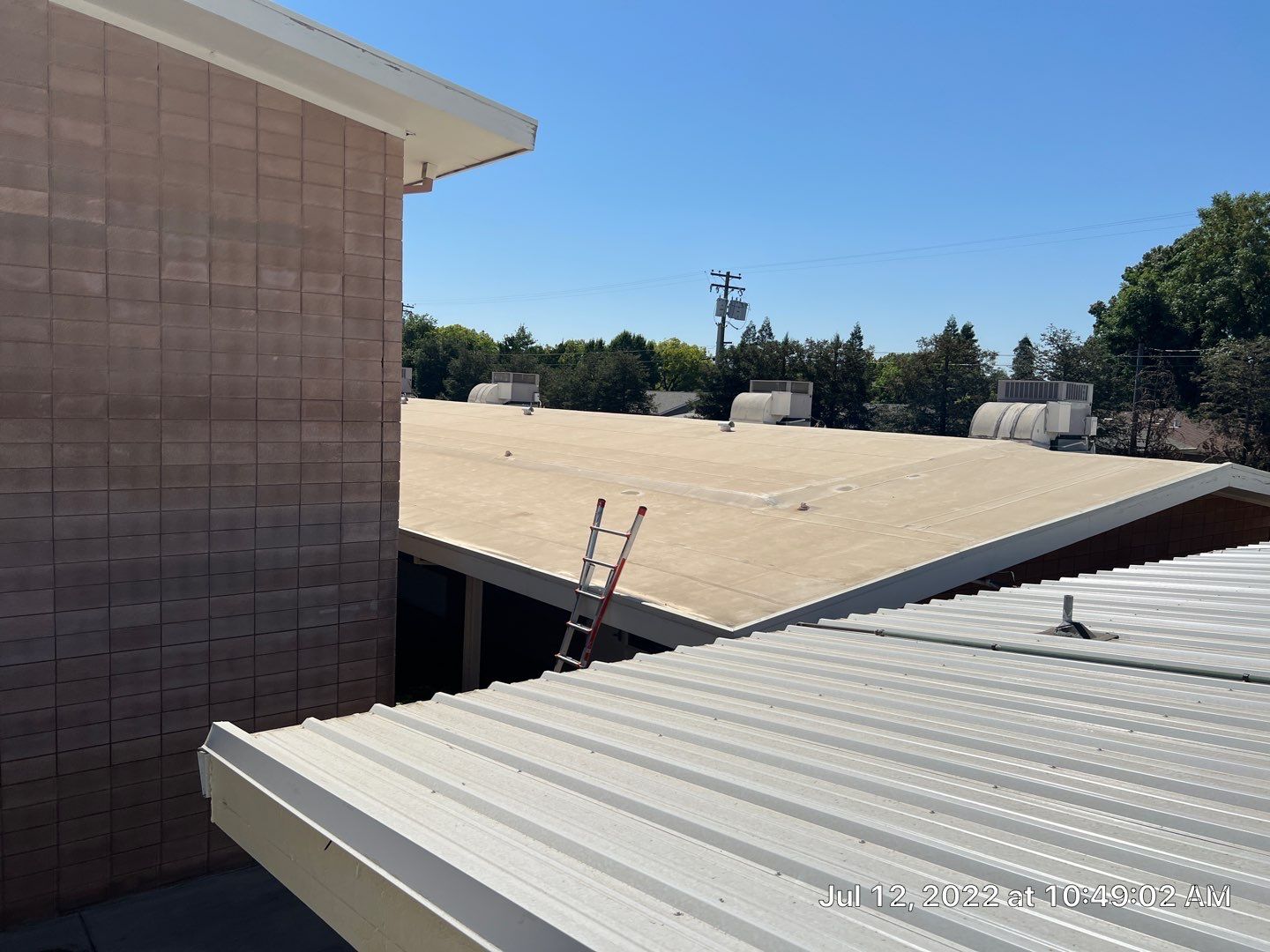 MR Roofing system using Benchmark/PUMA XL coatings over TPO single-ply roofing by Straight Edge Roofing Inc