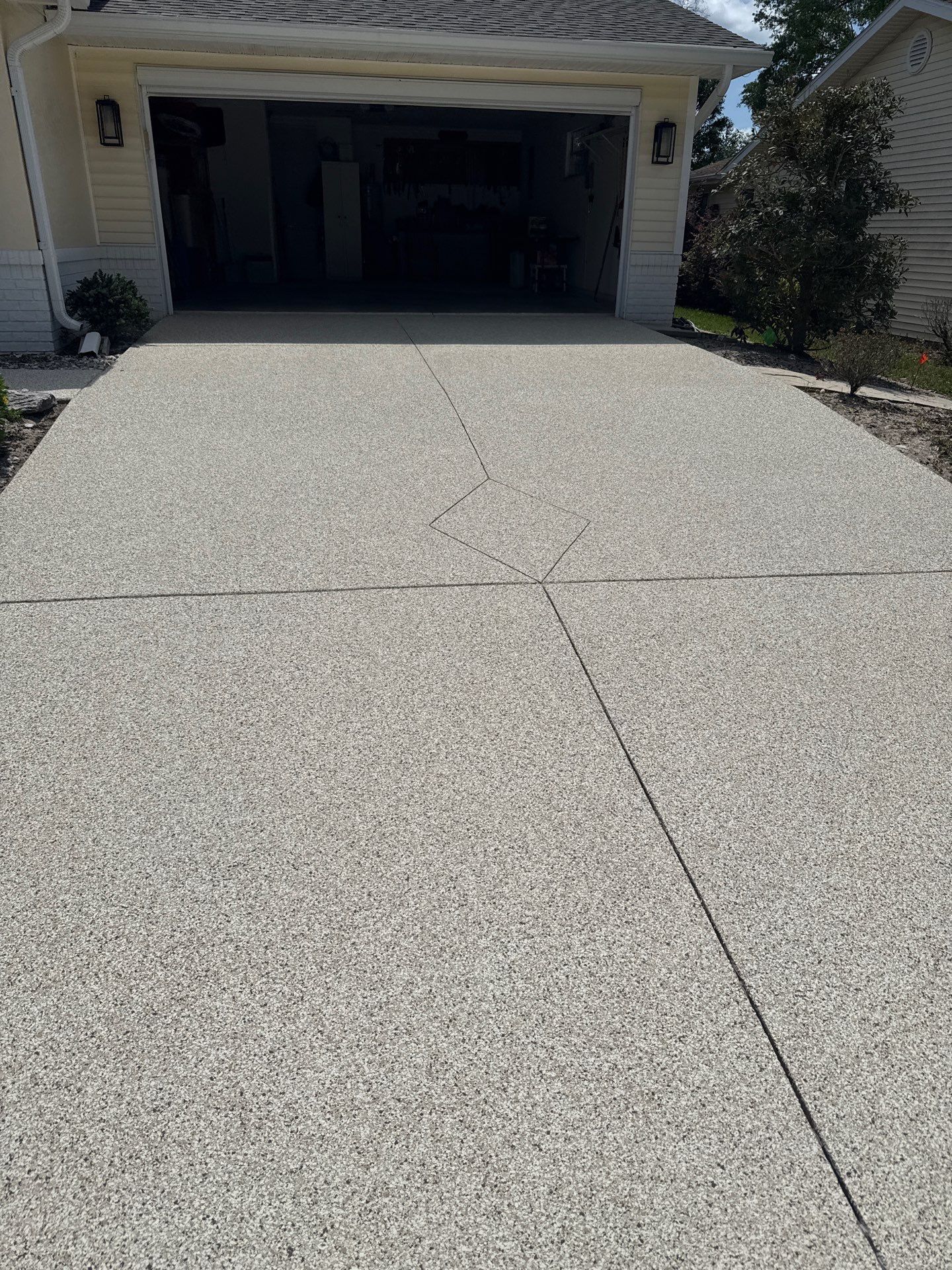 Driveway & Sidewalk Buffalo by Innovative Concrete Coatings 