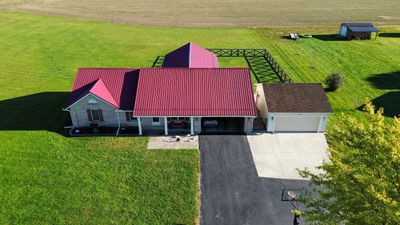 Residential Roofing Installation using Performance Panel Metal - Burgandy