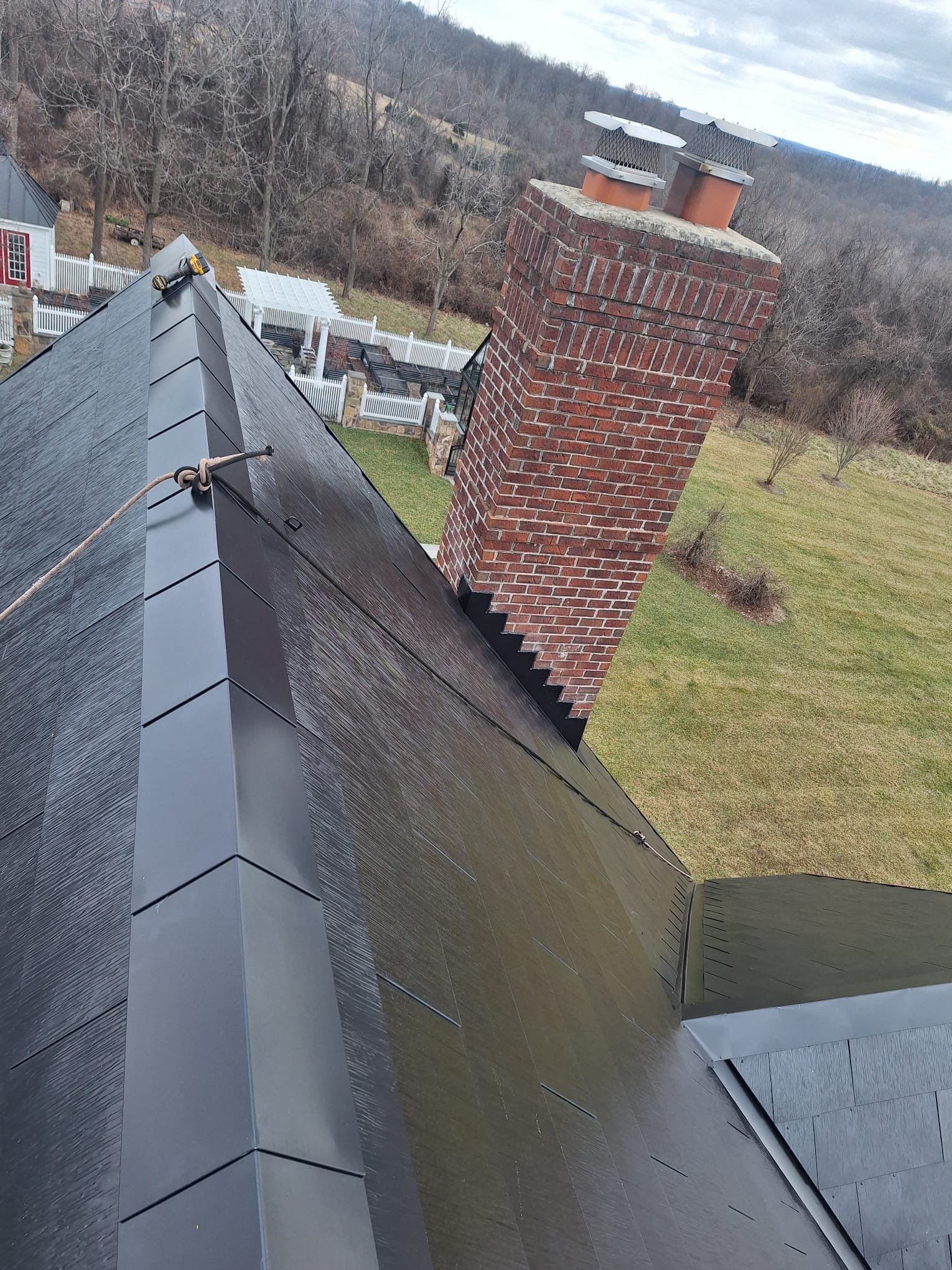 Tesla Solar Roof  using Tesla Powerwall by American Home Contractors