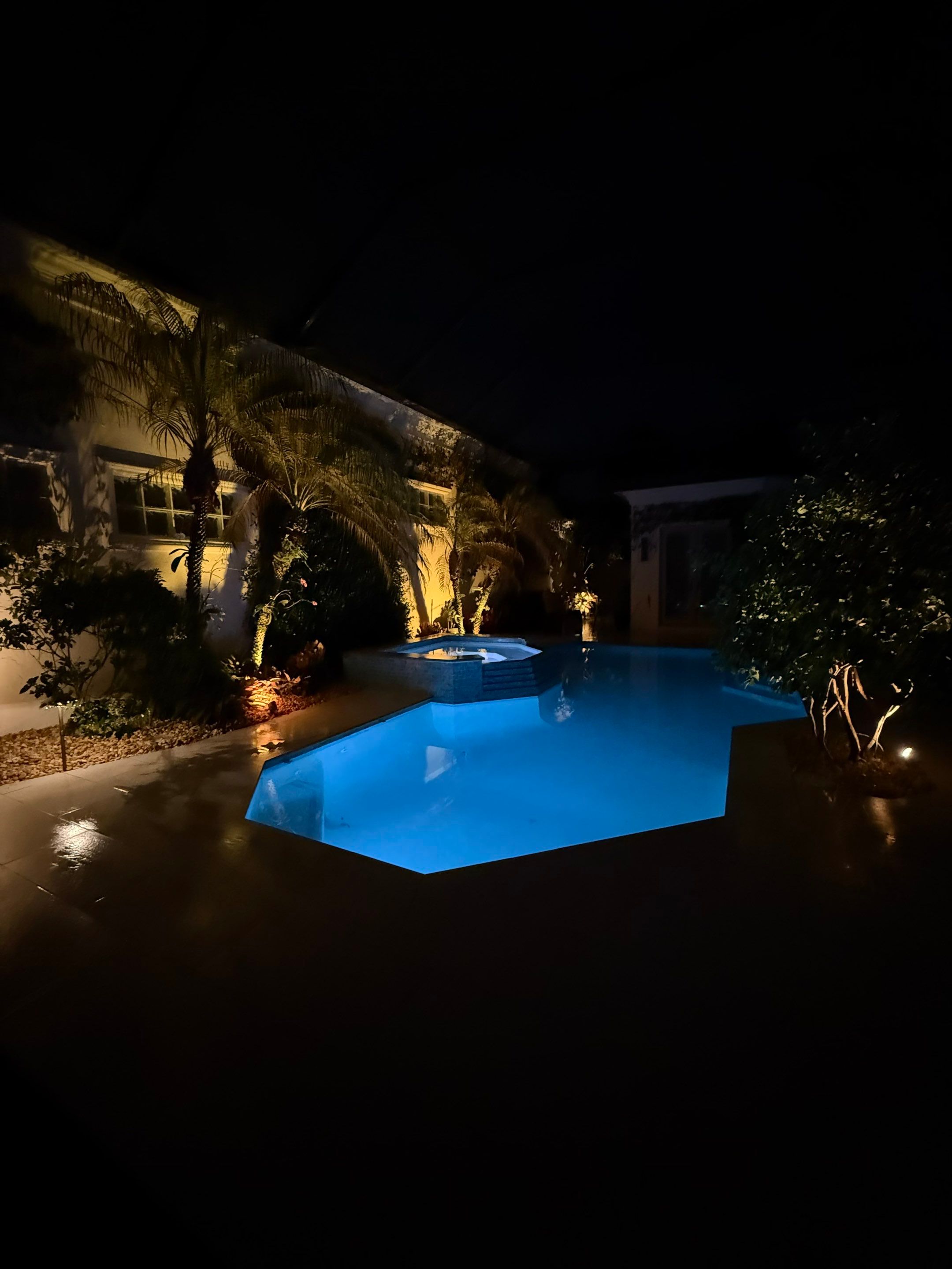 Pool Deck/Landscape/landscape lighting/pool coping/porcelain pavers/Pelican Marsh by Old Town Pavers Llc