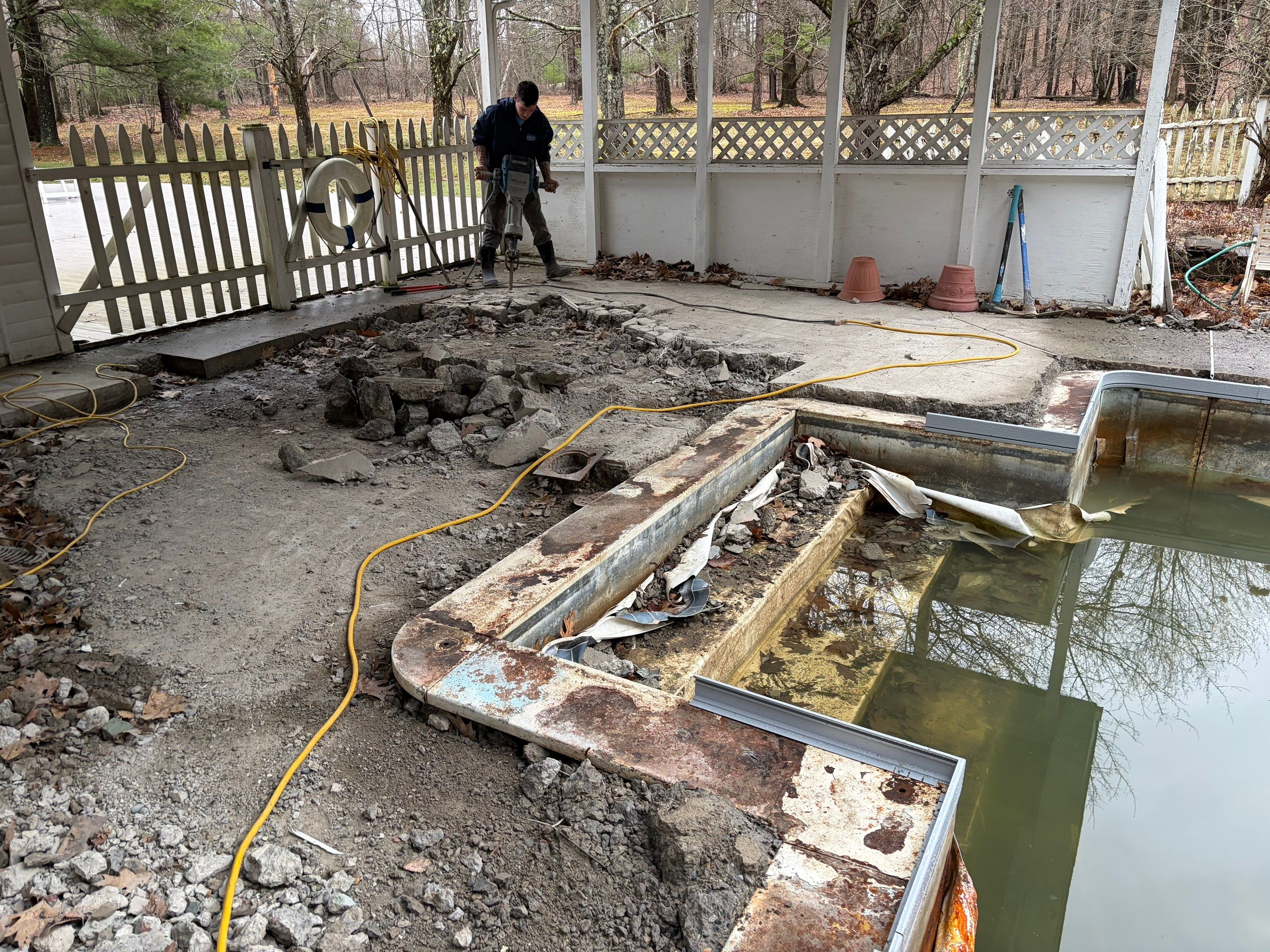 In-Ground Swimming Pool Renovation and Concrete Decking in Old Chatham by Cypress Pools and Spas