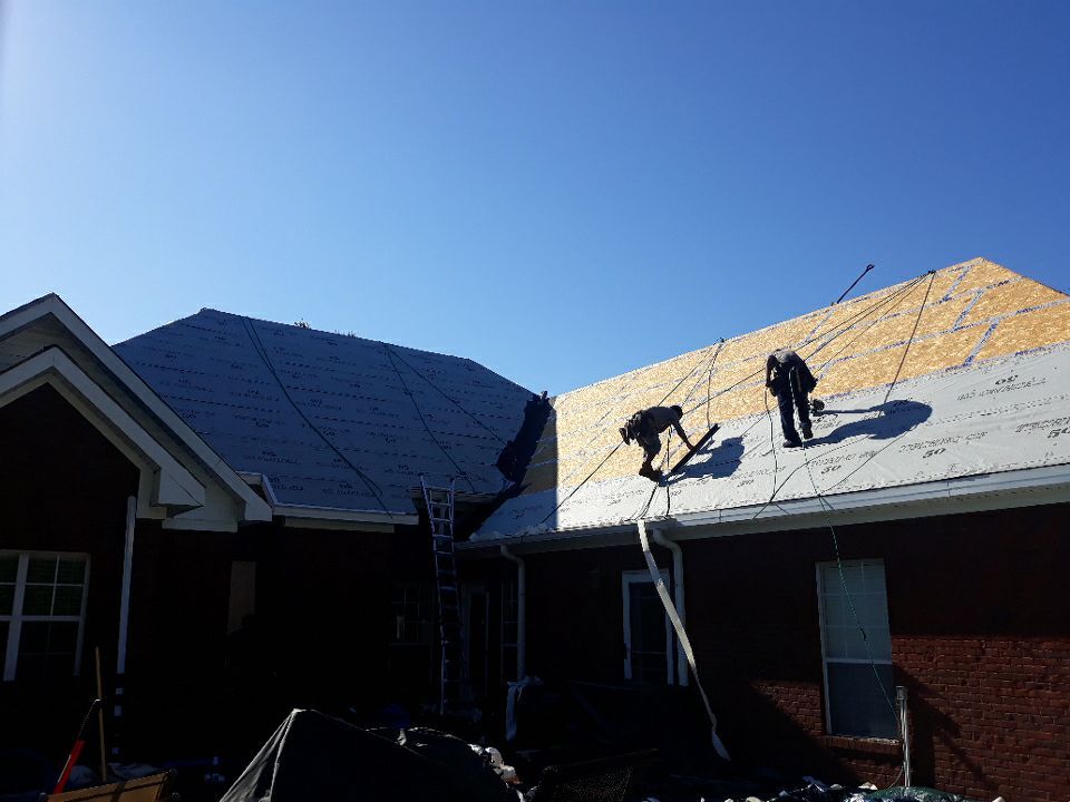 Residential Roofing Installation using Roof Replacement by American Roofing & Construction LLC