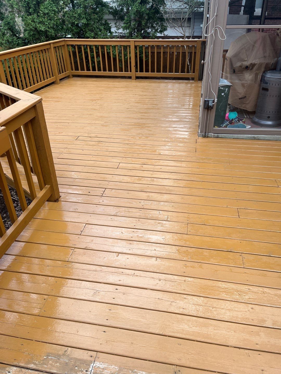 Wood cleaning and staining using Armstrong cloark oil stain by Northern Power Washing LLC.