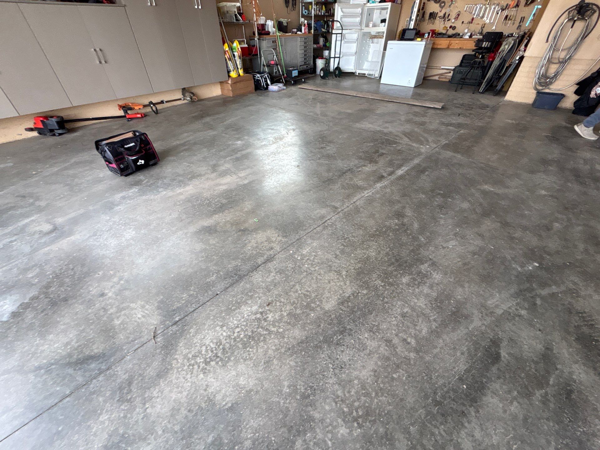 Residential Garage Floor Transformation with Speckled Epoxy Coating by Select Painting, Coatings & Garage Cabinets