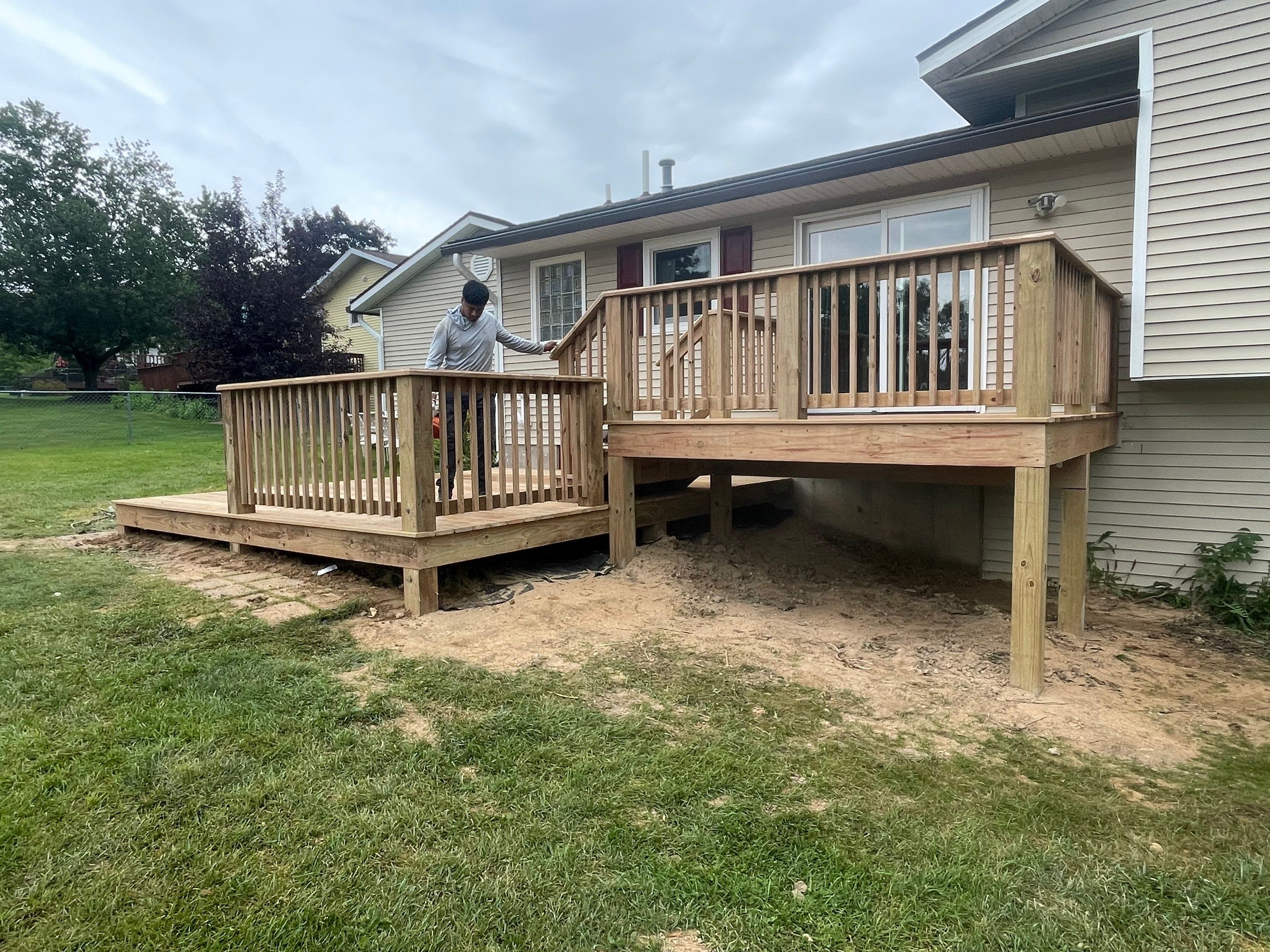 Deck Installation using Treated Lumber by Avalon Roofing and Exteriors