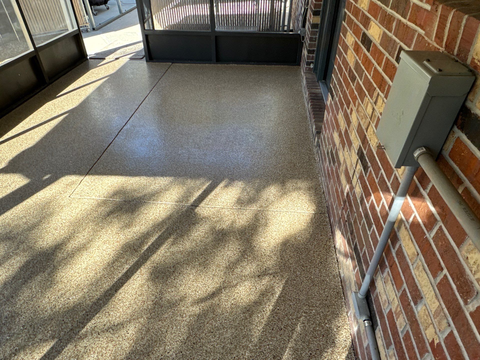 Porch in Gainesville, FL in Pecan by Cross Creek Concrete Coatings