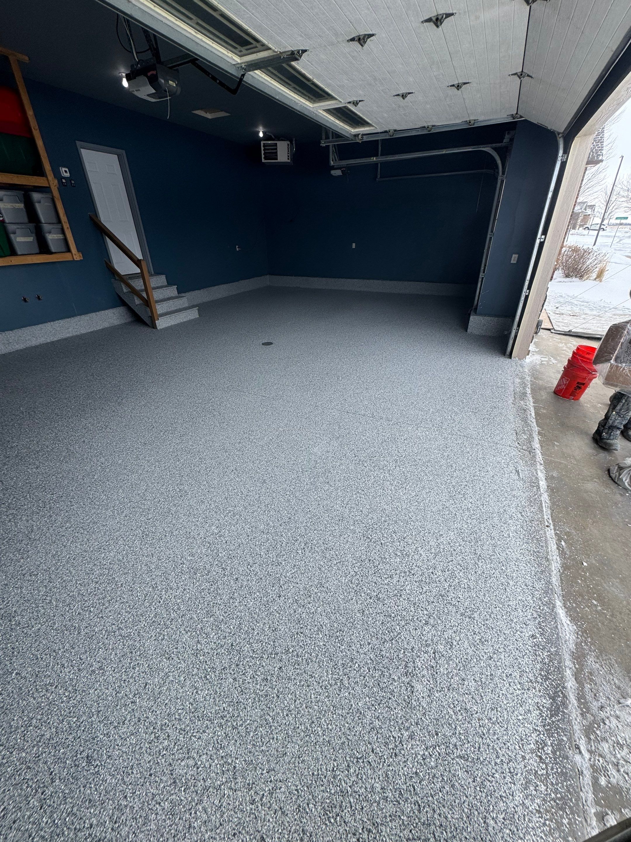 Grey Speckled Epoxy Garage Floor and Stair Coating in Sioux Falls by Select Painting, Coatings & Garage Cabinets