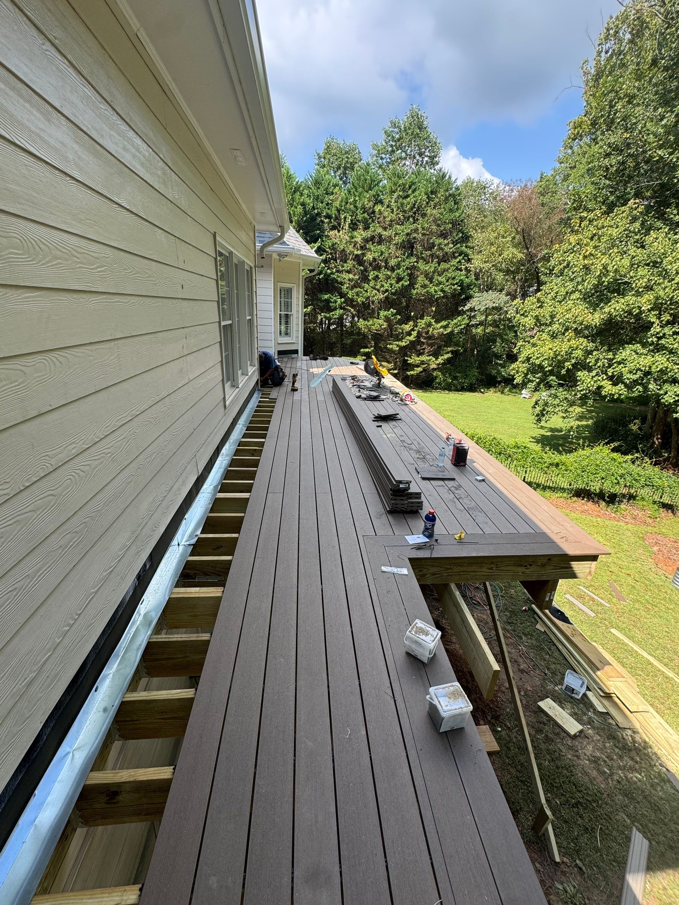 Elevated Composite Deck Replacement with Metal Railings in Smyrna by Swift Home Renovations 