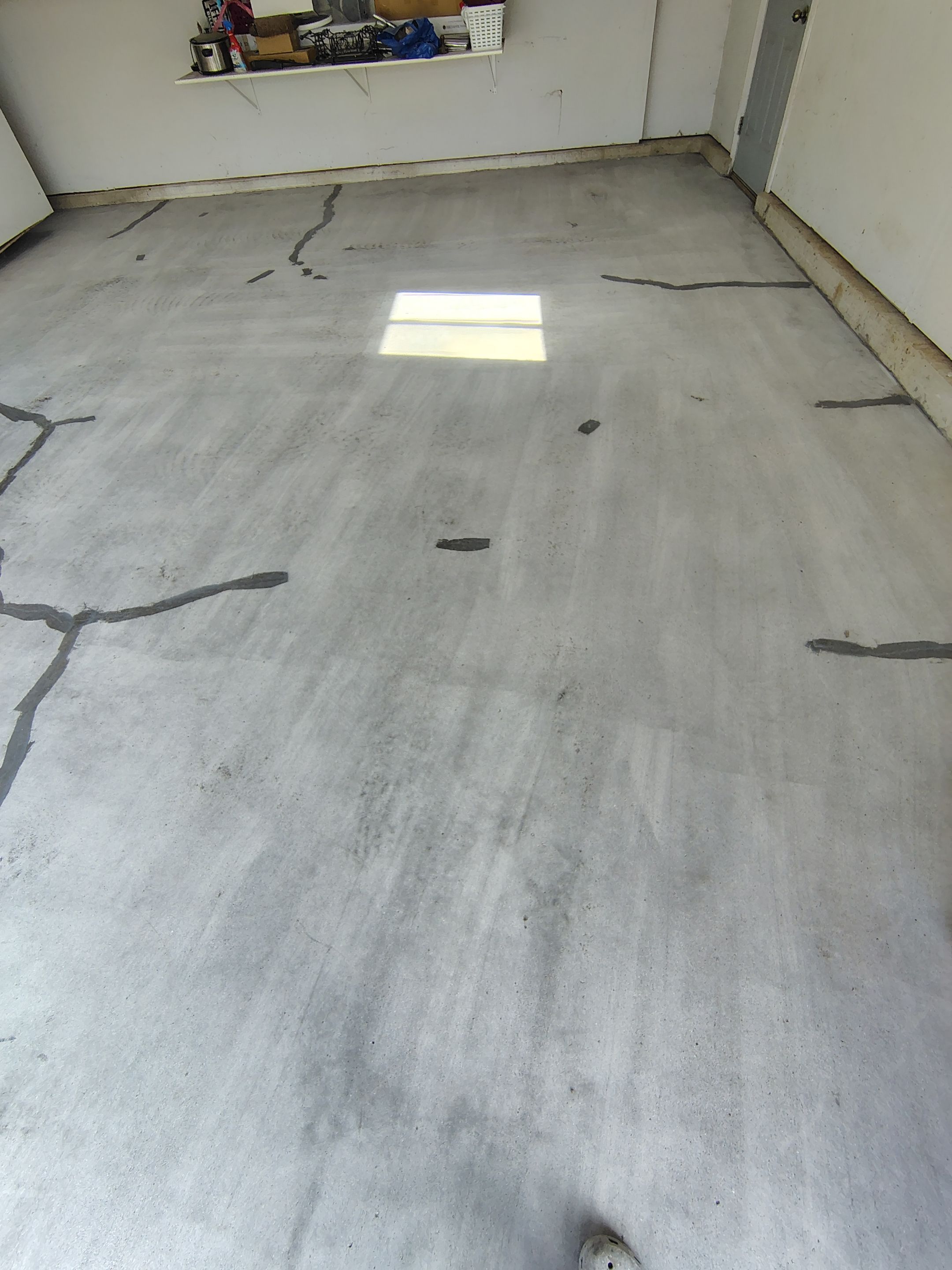 Decorative Chip Epoxy Garage Floor Coating in Sioux Falls by Select Painting, Coatings & Garage Cabinets