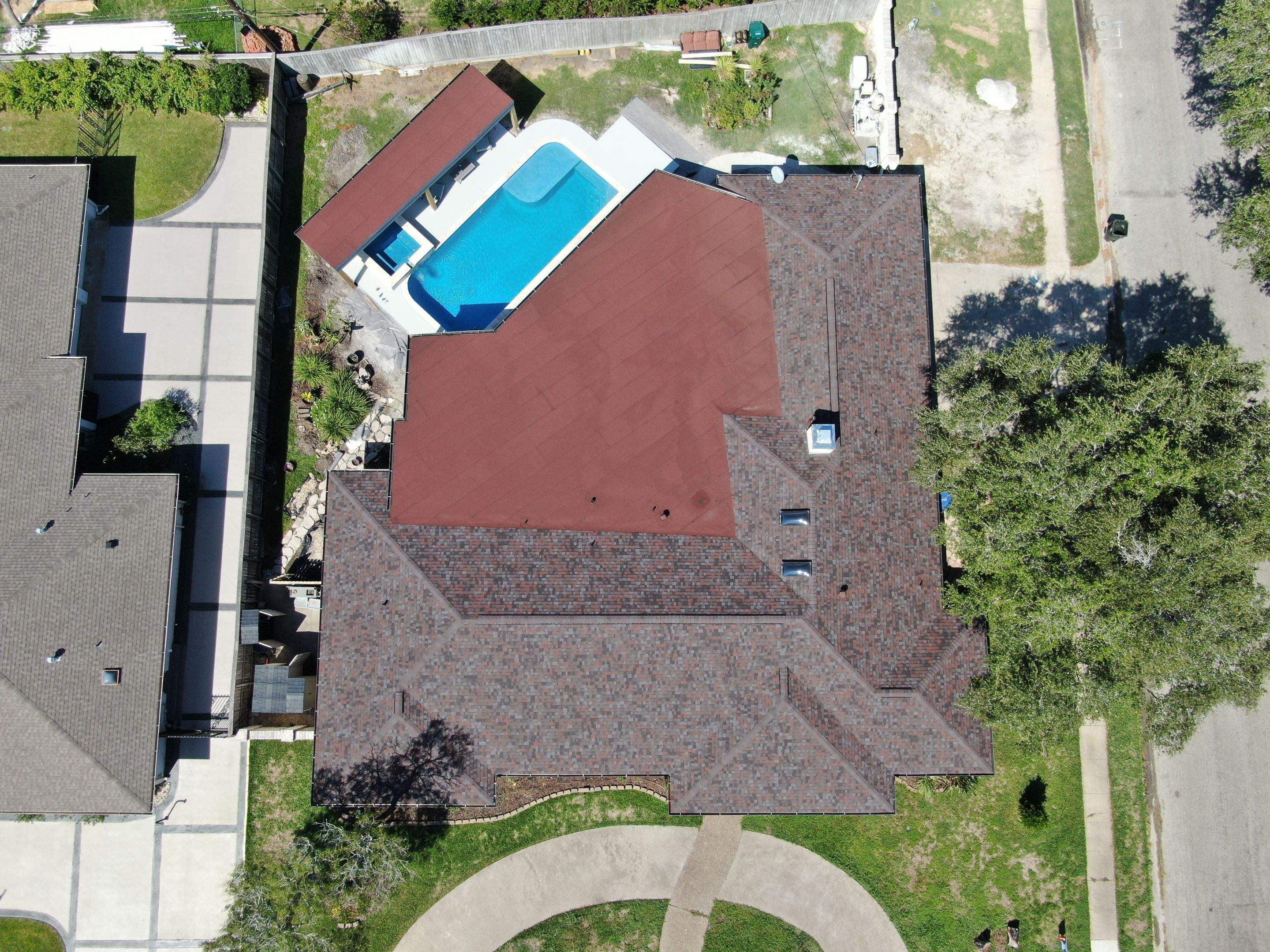 Beautiful pool side build by Bayfront Roofing and Construction