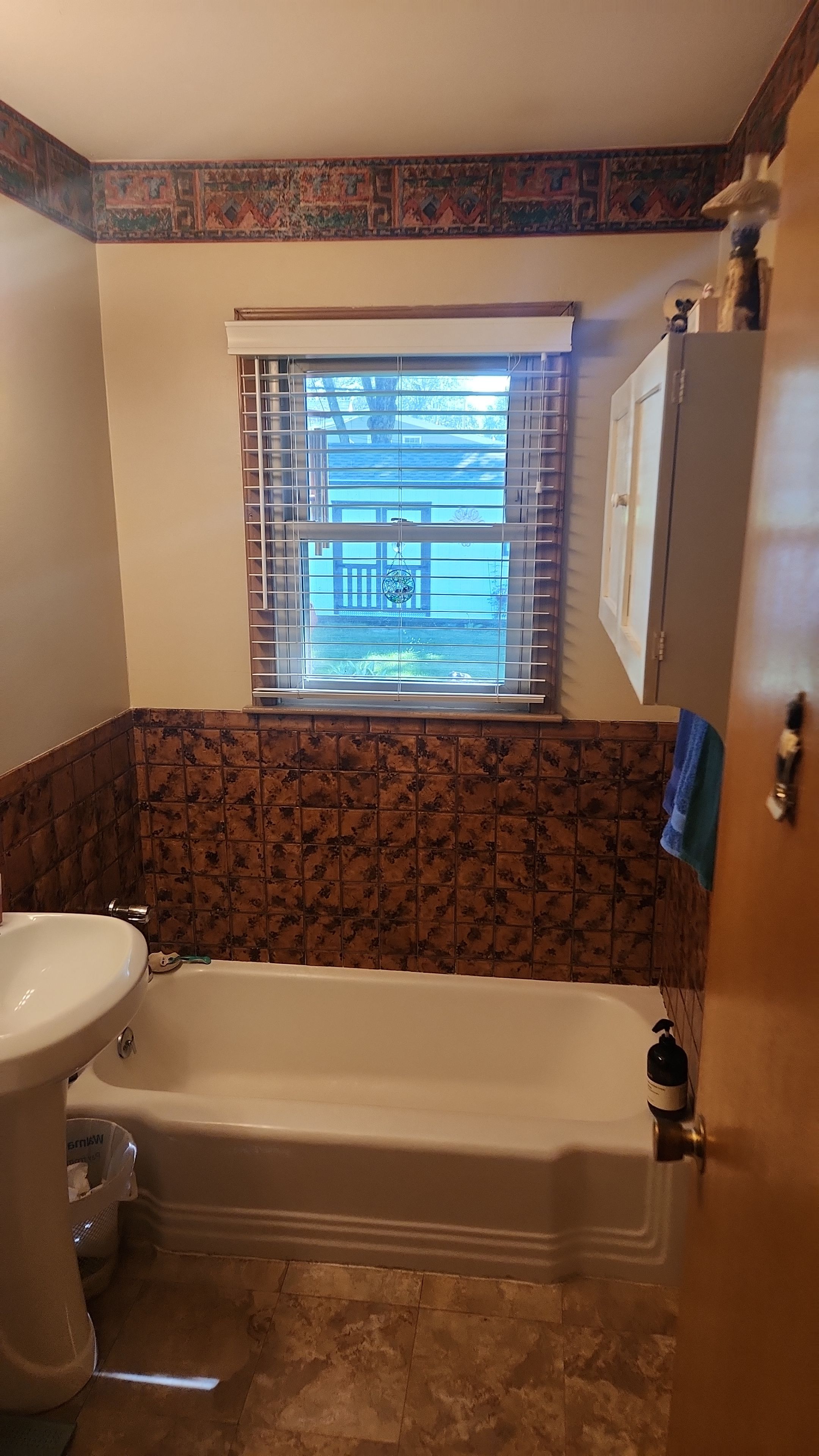 Tiny Bathroom Remodel by The Shower Company