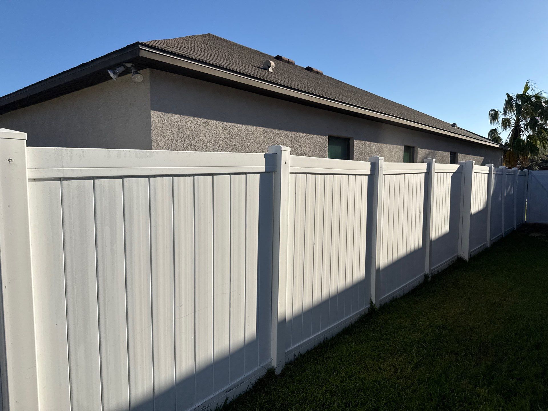 Comprehensive Concrete and Vinyl Fence Cleaning in Willow Walk Community, Palmetto, FL by Sunshine AquaWash