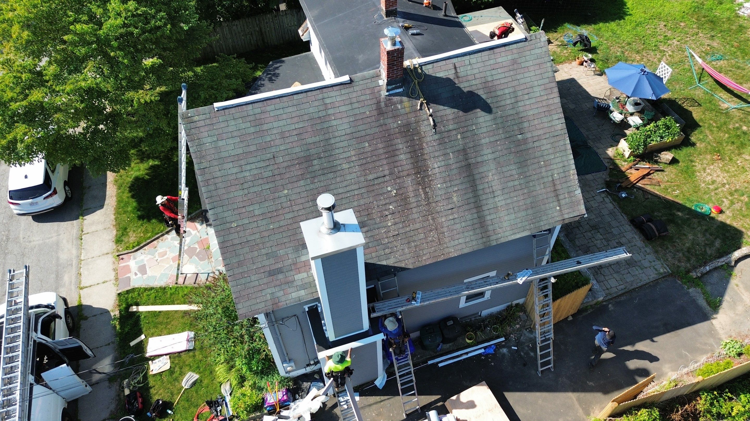 Full Roof Replacement + Custom Gutter Install | Onyx Black Finish by Mighty Dog Roofing of Greater Middlesex County