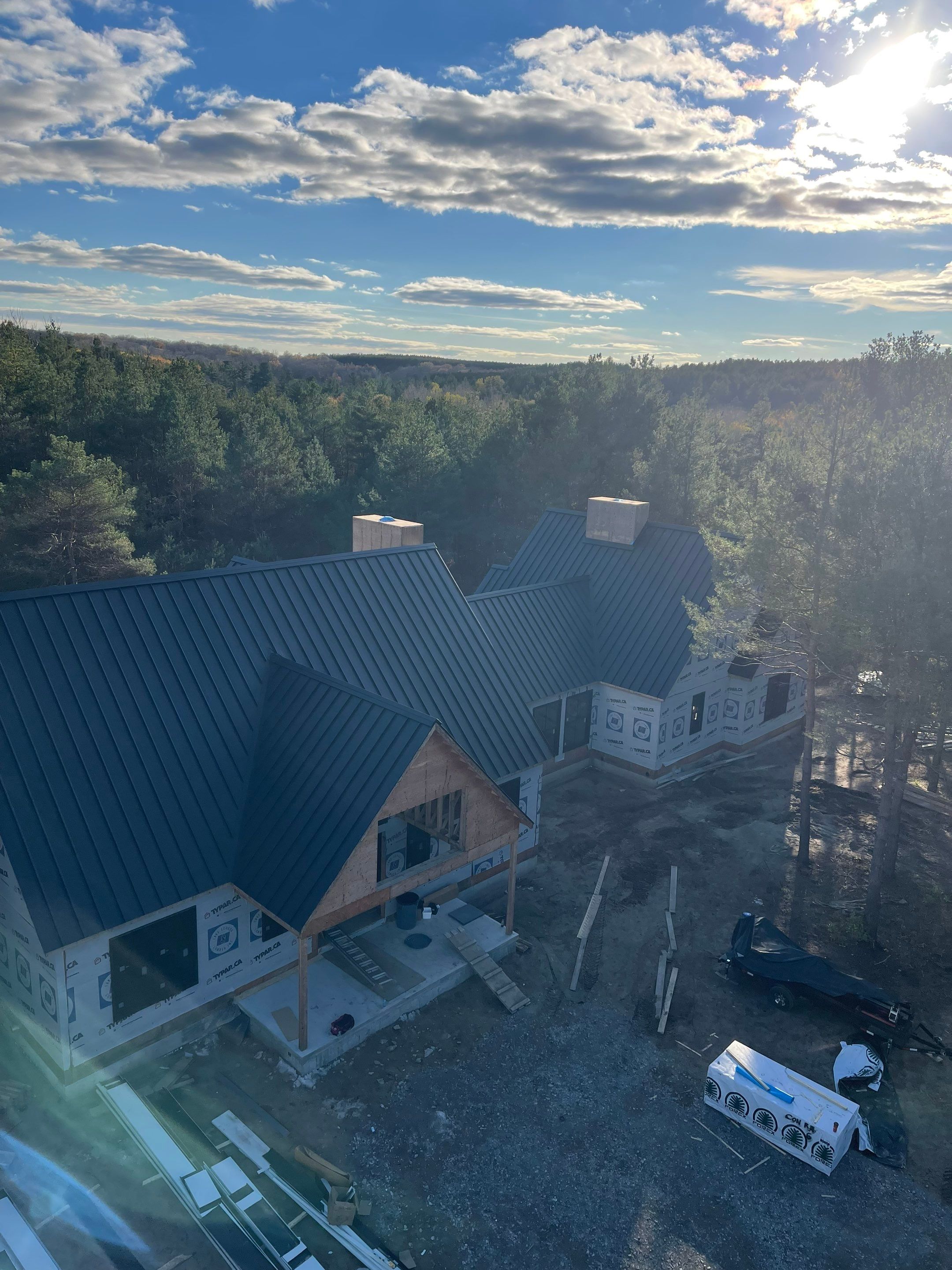 New Home Construction using 16" Standing Seam Panels by Jay Carter Roofing & Sheet Metal