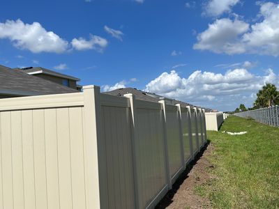 Vinyl Fence Installation using Tan Vinyl Privacy Fence