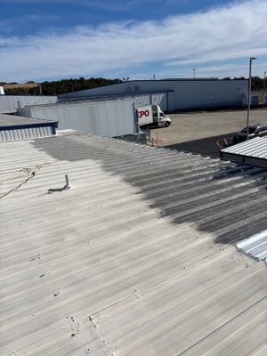 Wide angle view of a completed metal roof.
