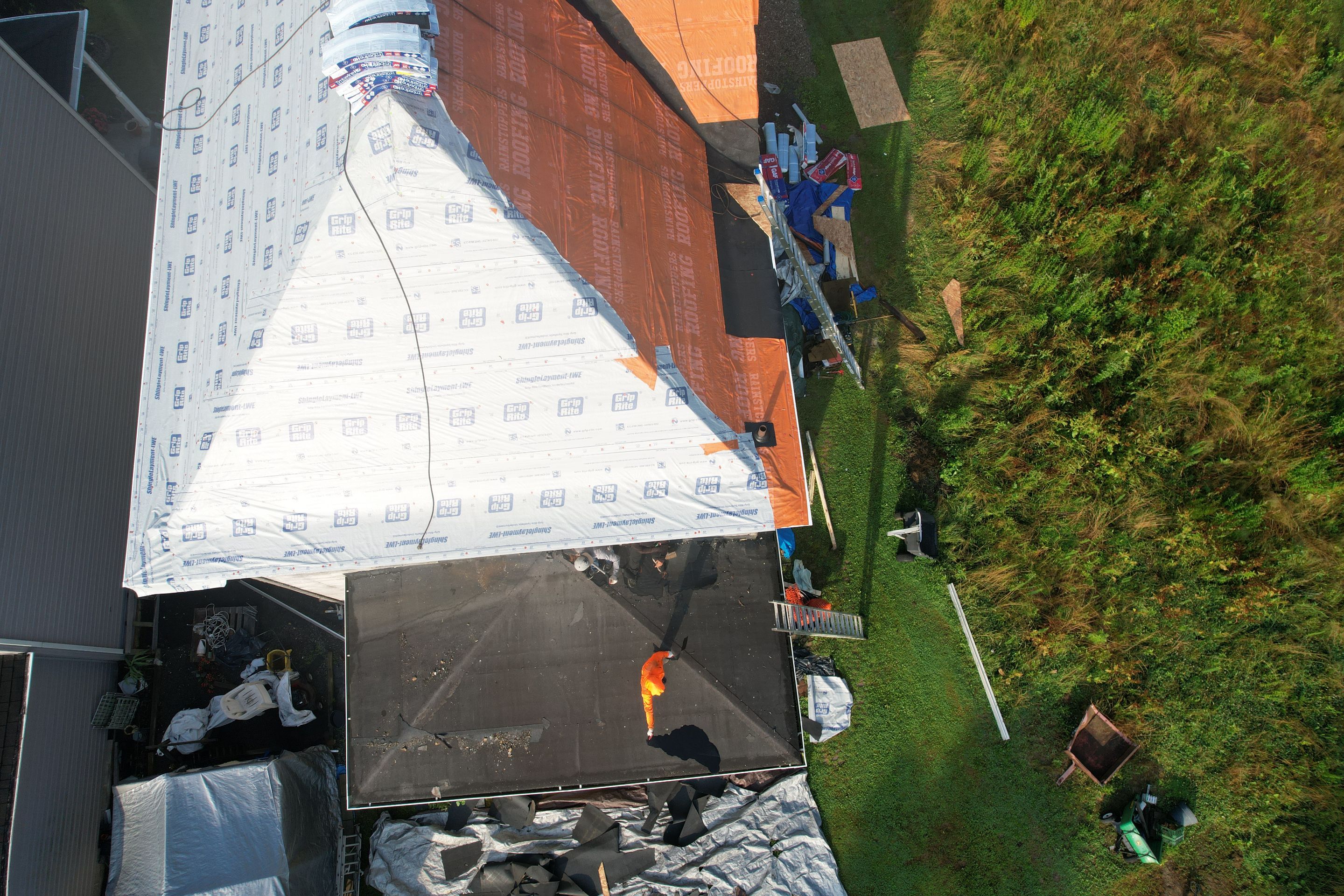 Residential Roofing Installation using GAF Timberline HDZ Charcoal by Rainstoppers Roofing